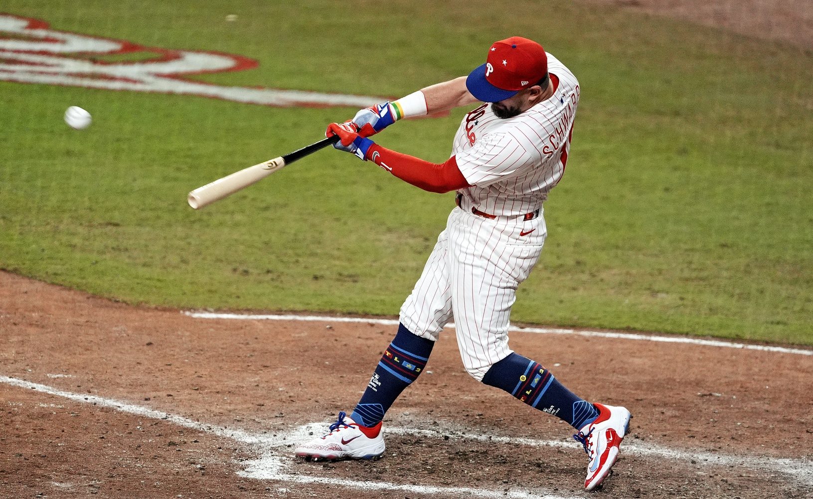 National League designated hitter Kyle Schwarber (12) of the Philadelphia Phillies hits a home run in the swing off of after the 2025 MLB All Star Game ended in a tie at Truist Park.