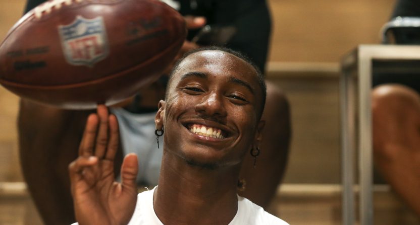 Mar 4, 2021; Weston, Florida, USA; Former UCF Knights kicker Deestroying Donald De La Haye spins a football over his finger during the House of Athlete Scouting Combine for athletes preparing to enter the 2021 NFL draft. Mandatory Credit: Sam Navarro-USA TODAY Sports