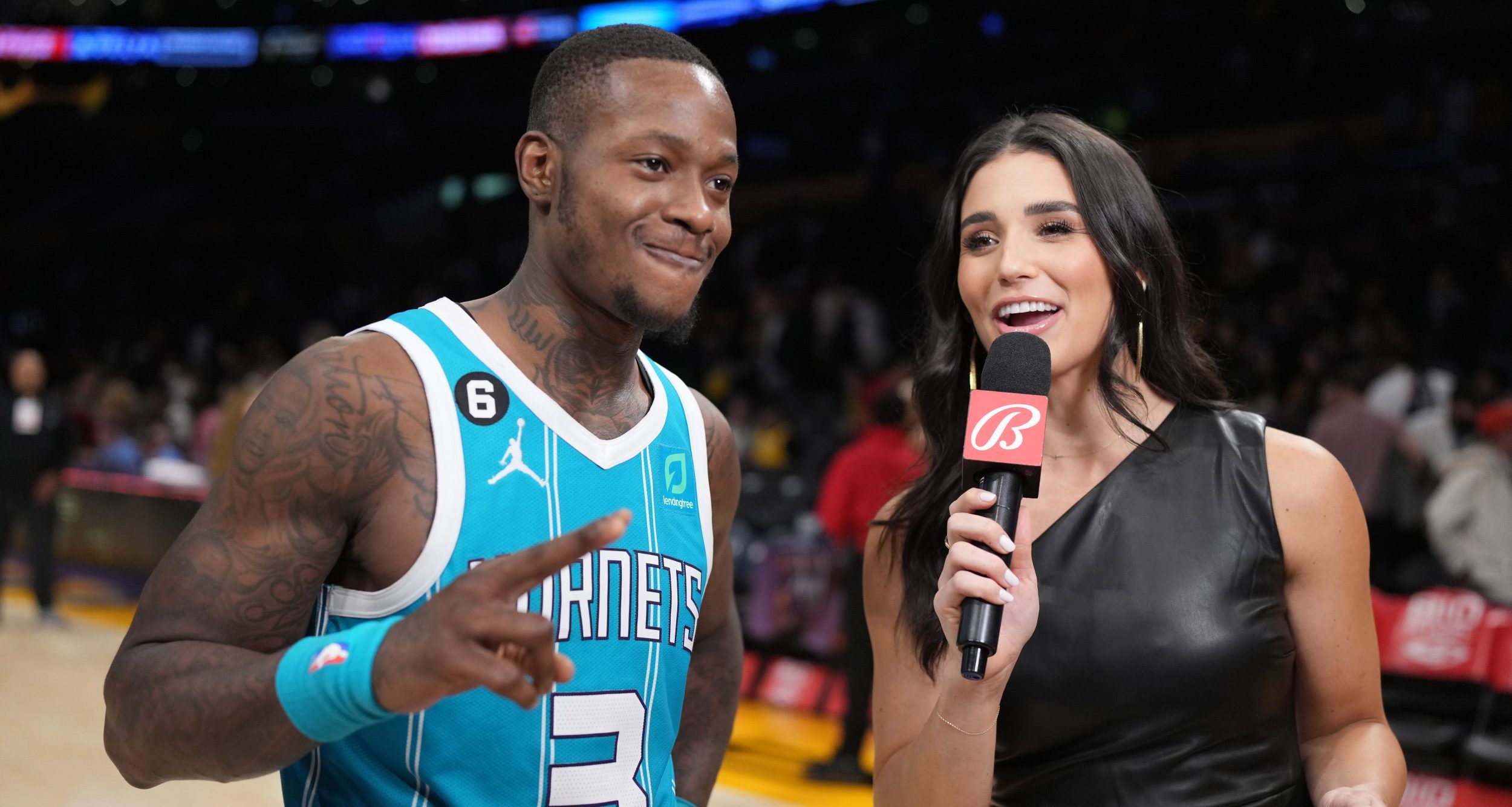 Dec 23, 2022; Los Angeles, California, USA; Bally Sports sideline reporter Ashley ShahAhmadi (right) interviews Charlotte Hornets guard Terry Rozier (3) after the game against the Los Angeles Lakers at Crypto.com Arena. The Hornets defeated the Lakers 134-130.