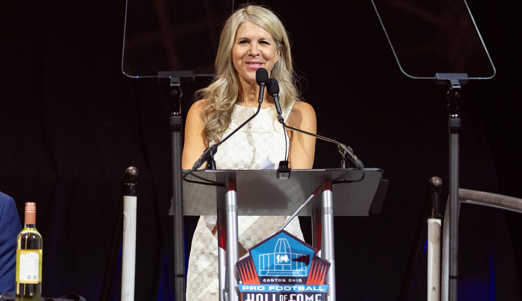 Aug 1, 2025; Canton, OH, USA; Mary Kay Cabot, the 57th Bill Nunn Memorial award honoree, speaks to the audience at the 2025 Pro Football Hall of Fame Enshrinees’ Gold Jacket Dinner at Canton Memorial Civic Center. Mandatory Credit: Scott Galvin-Imagn Images