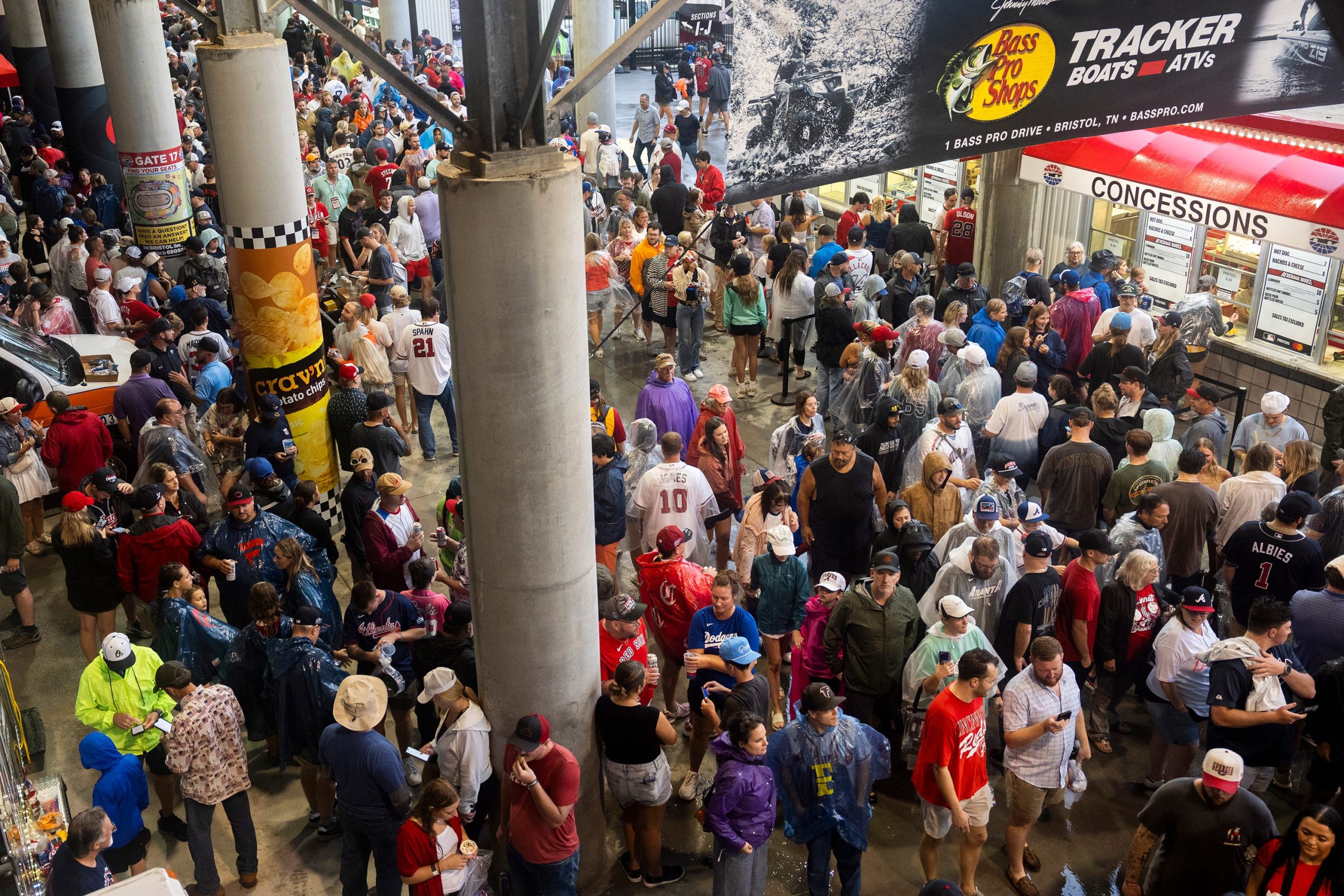 People wait out the rain delay in the concourse area before the MLB Speedway Classic held at Bristol Motor Speedway in Bristol, Tenn., on August 2, 2025.