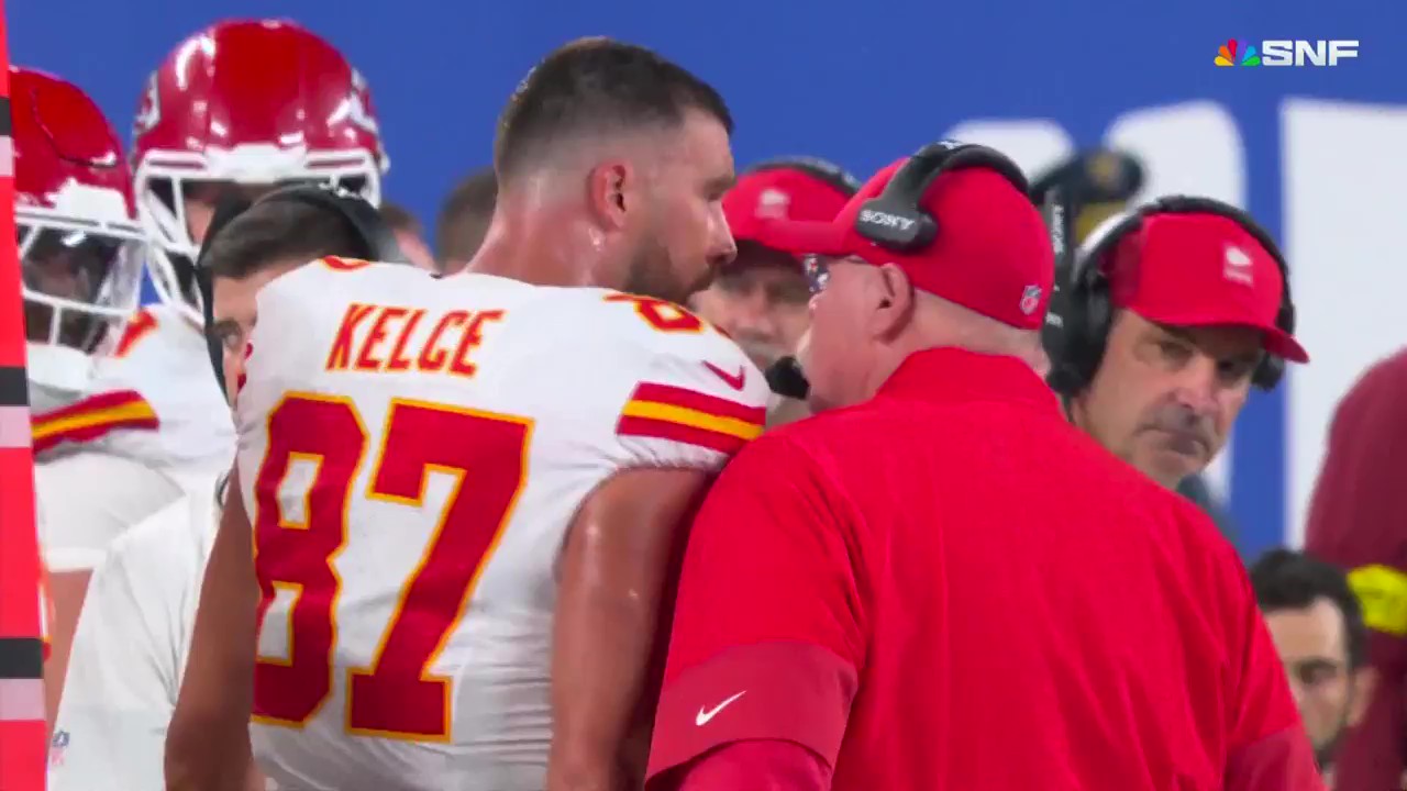 NBC's Mike Tirico and Cris Collinsworth commented on a heated argument between Chiefs coach Andy Reid and tight end Travis Kelce. Photo Credit: NBC
