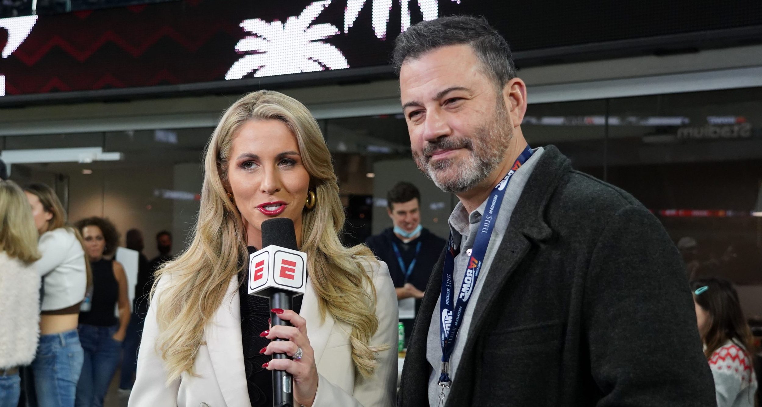 ESPN sideline reporter Laura Rutledge (left) interviews Jimmy Kimmel