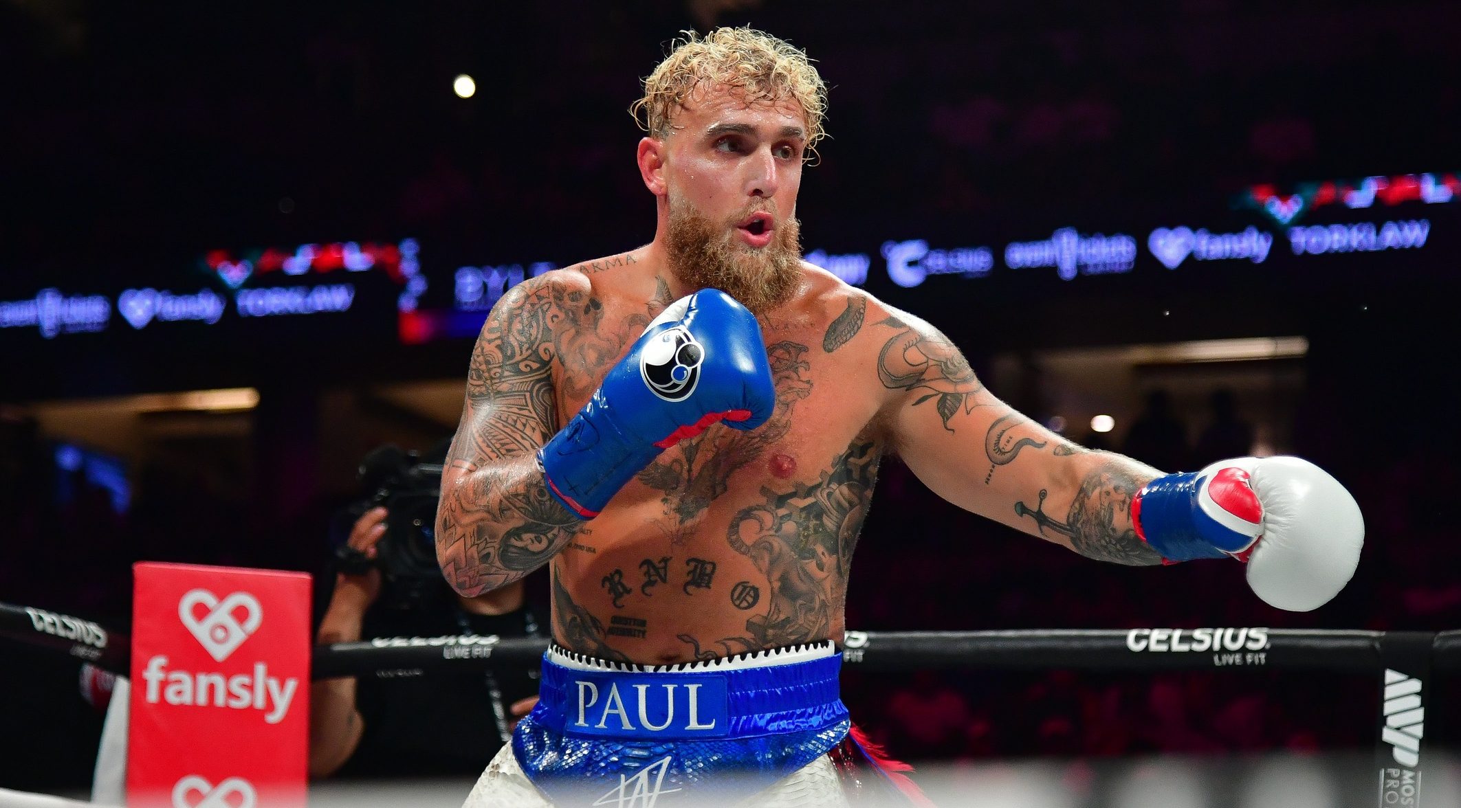 Jun 28, 2025; Anaheim, California, USA; Jake Paul fights against Julio Cesar Chavez Jr. at Honda Center. Mandatory Credit: Gary A. Vasquez-Imagn Images