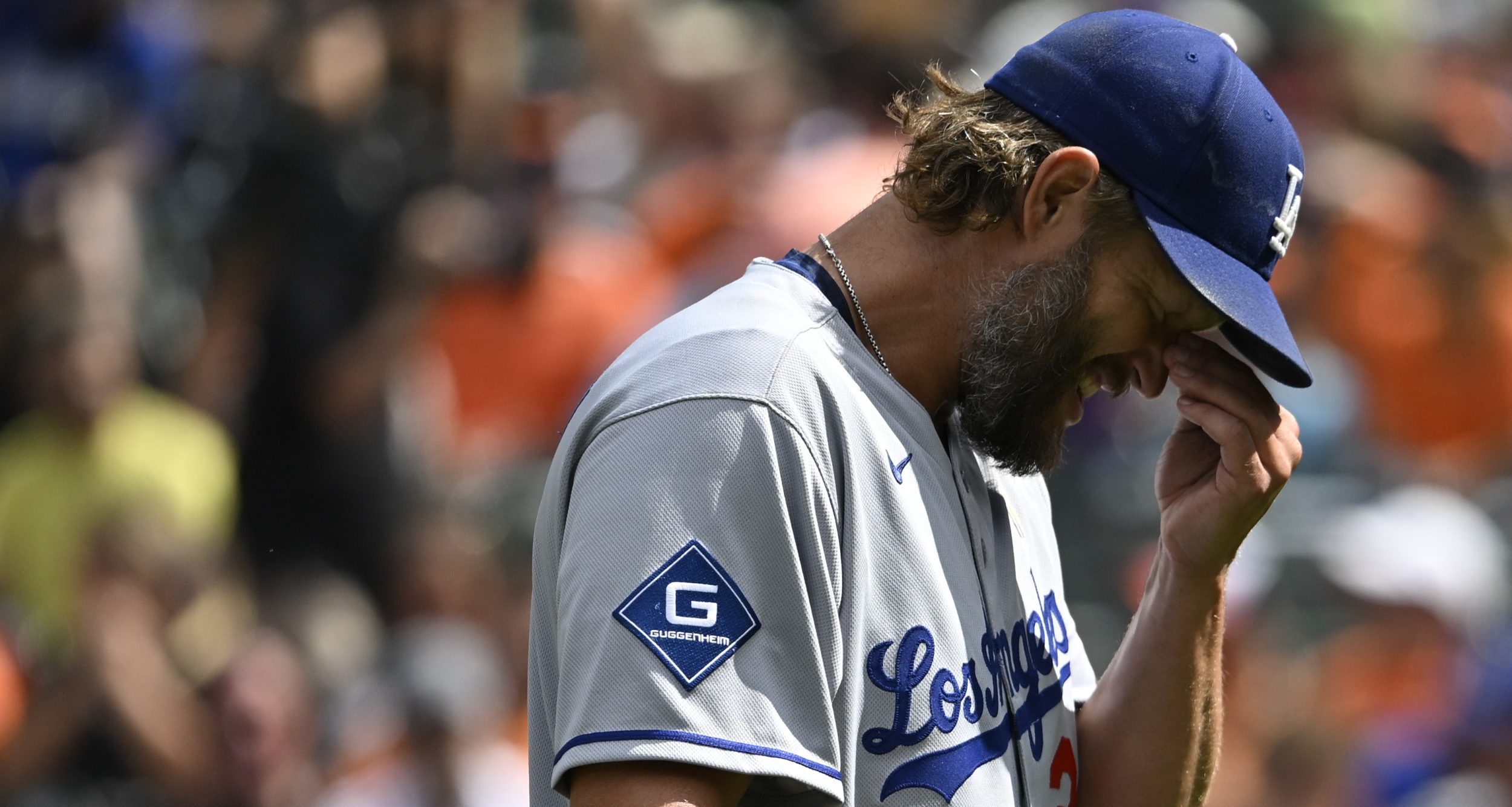 Sep 7, 2025; Baltimore, Maryland, USA; Los Angeles Dodgers pitcher Clayton Kershaw (22) walks to the dugout after the bottom of the second inning against the Baltimore Orioles at Oriole Park at Camden Yards.