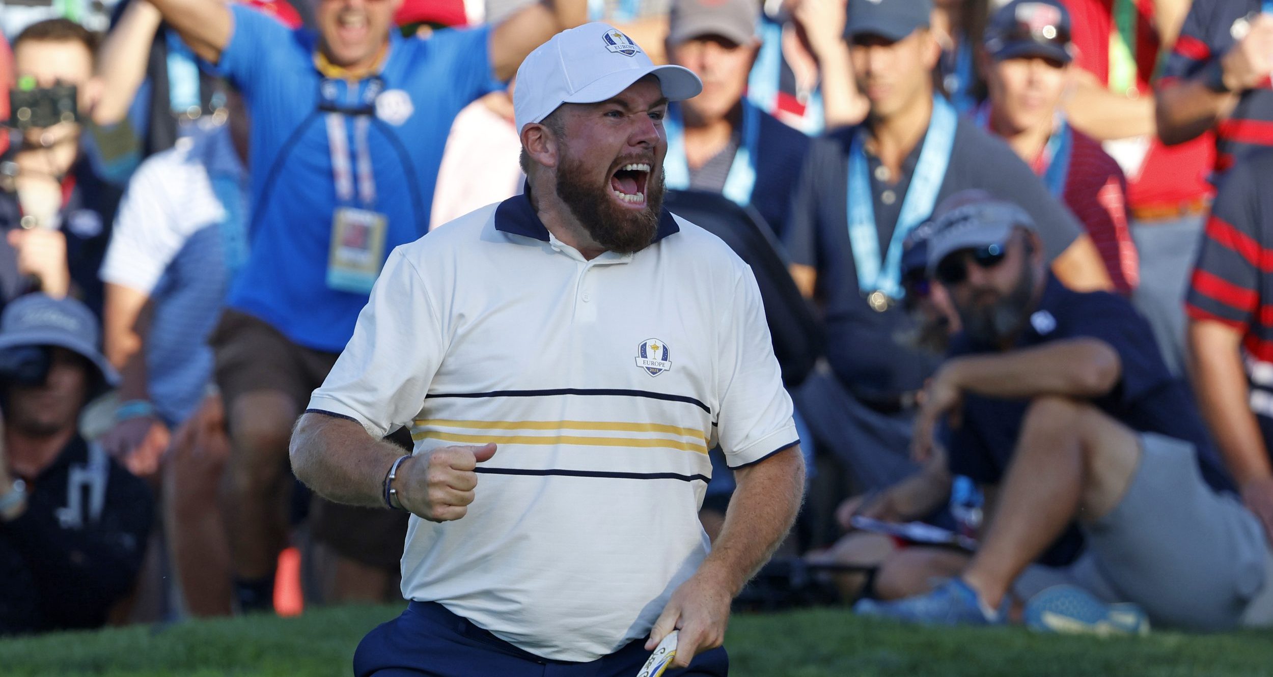 Shane Lowry reacts to his putt on the 18th hole on the final day of competition for the Ryder Cup