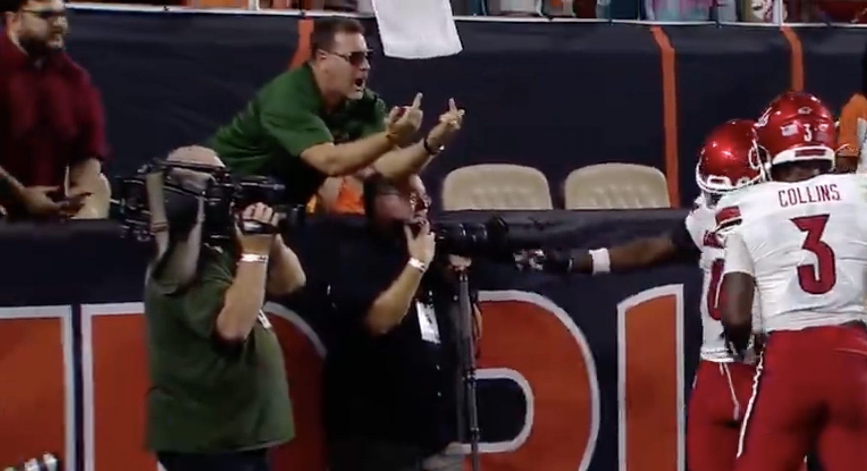 Miami fan flips double bird at Louisville player on ESPN broadcast