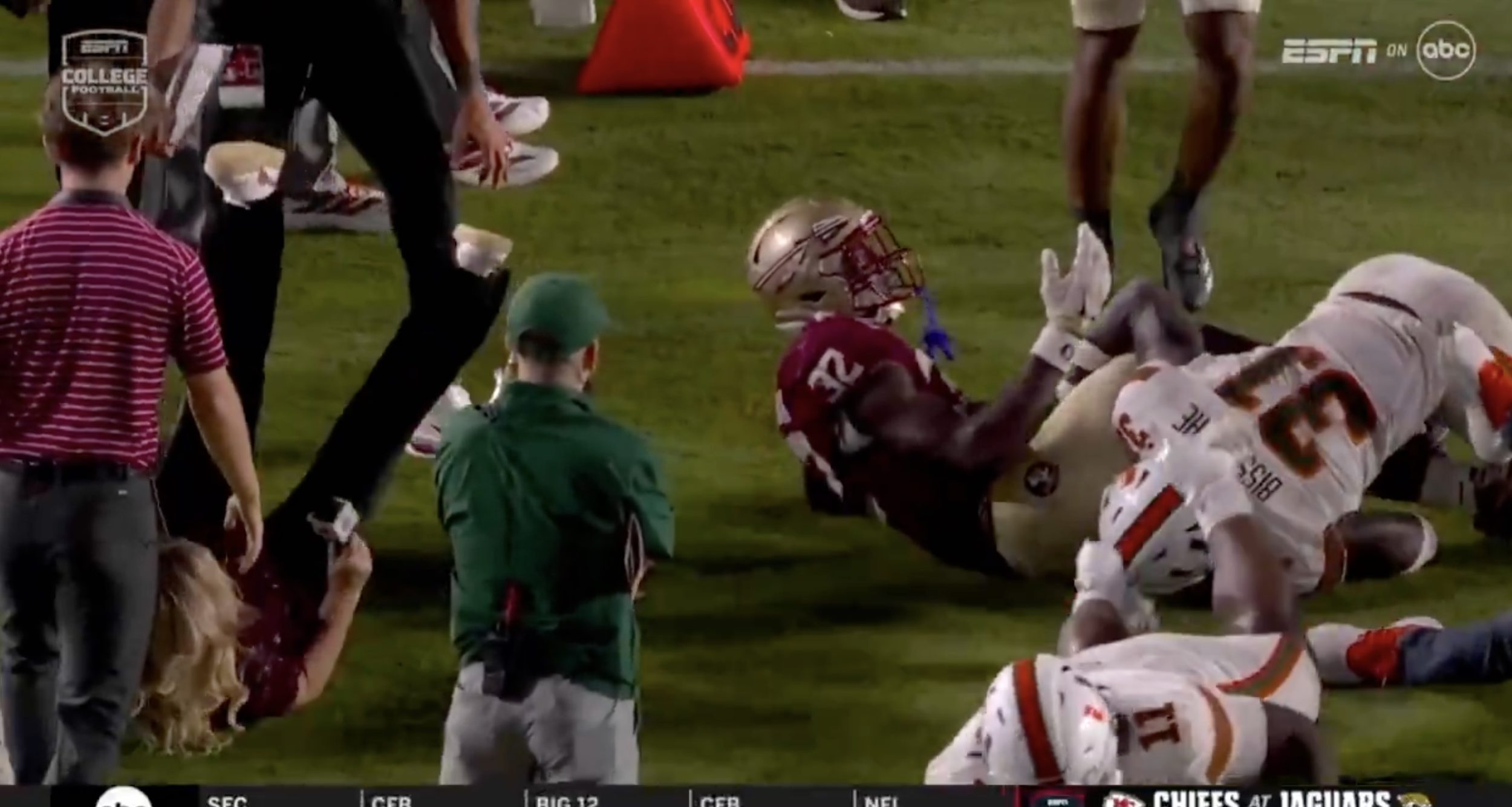 ESPN/ABC’s Holly Rowe takes sideline hit, immediately pops up to report on it