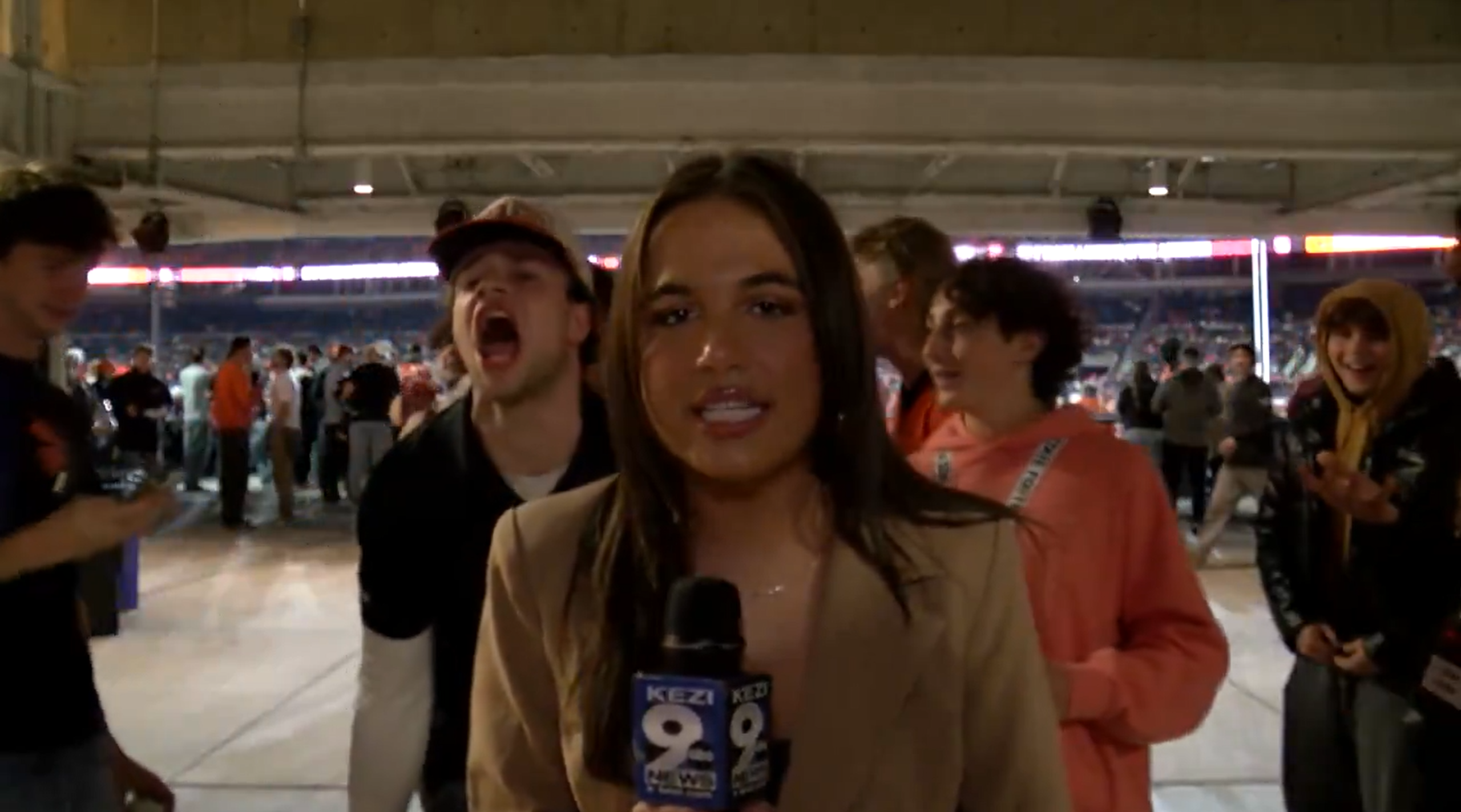 Local reporter unfazed by drunk weirdos yelling ‘6 7’ during live hit