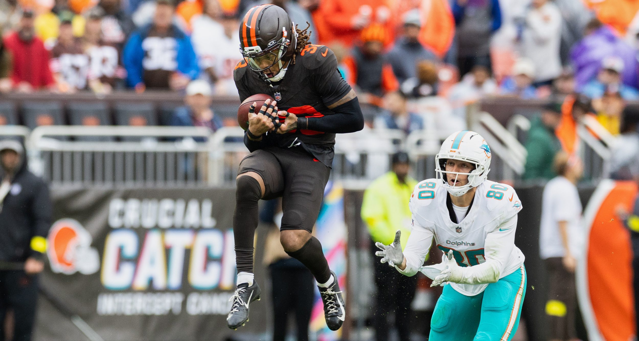 Tua Tagovailoa threw an interception during a CBS game update about another interception