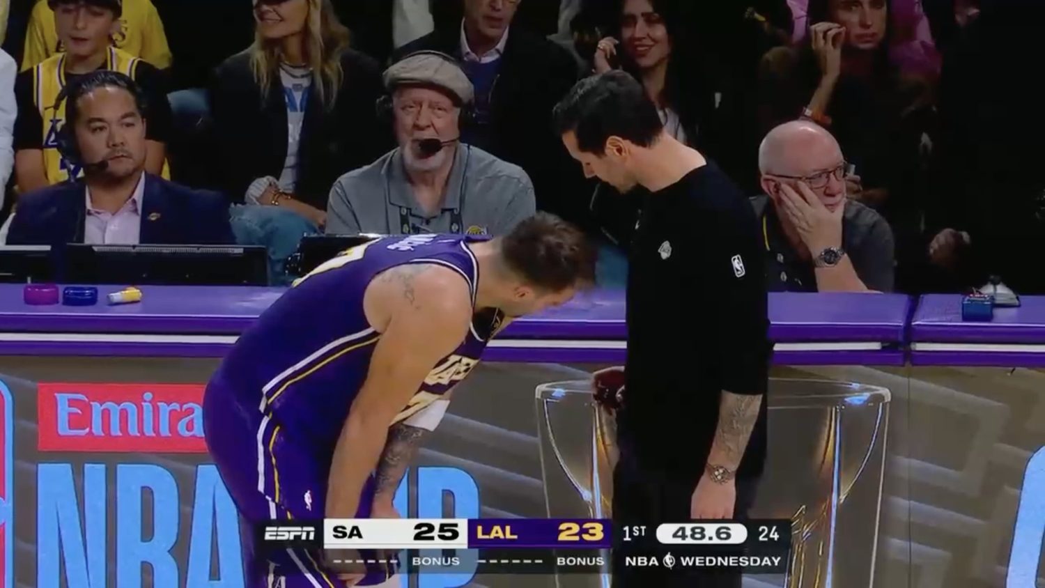 Did JJ Redick turn off his mic before talking to Luka Dončić?