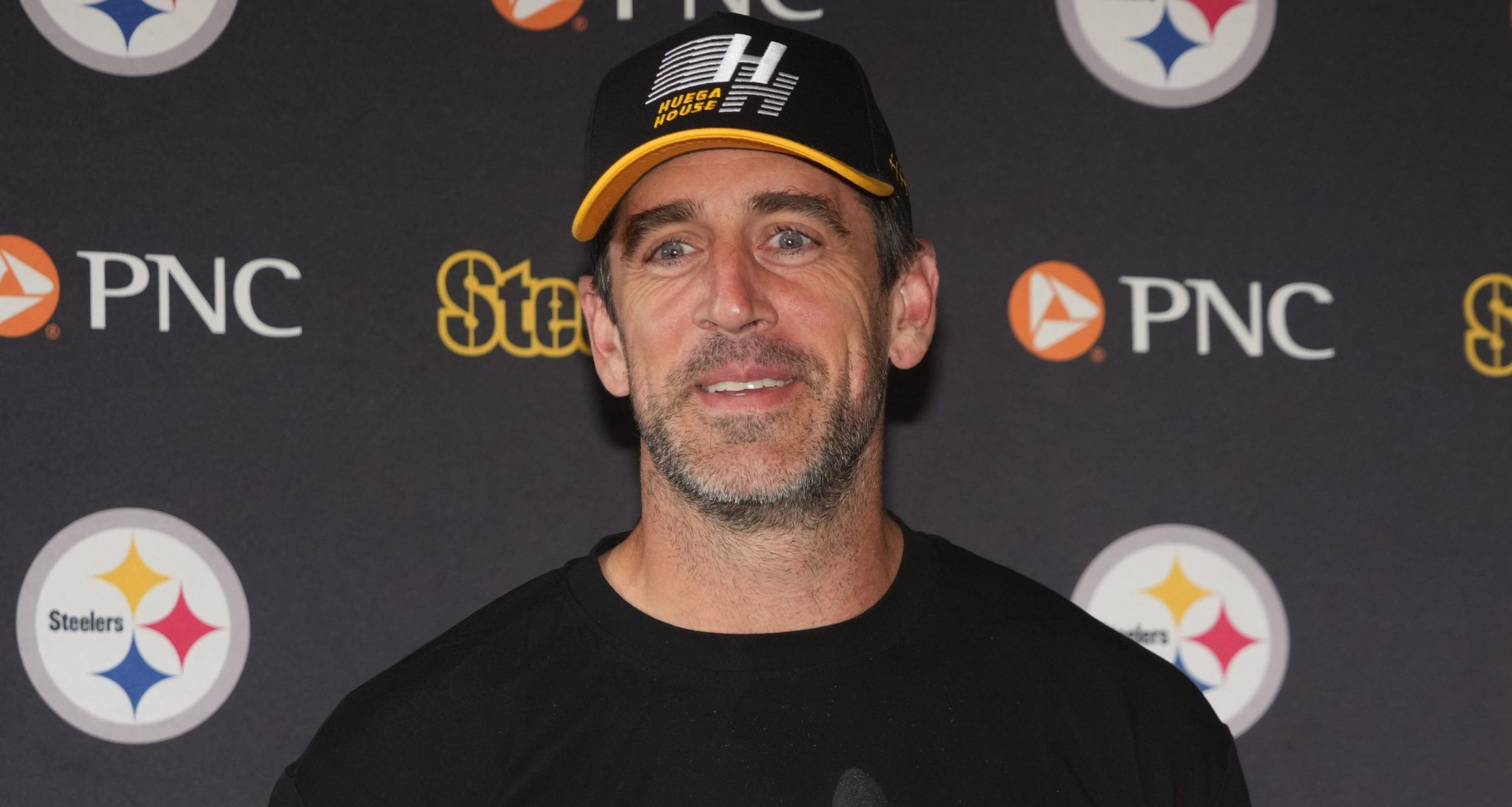 Aaron Rodgers denies Cris Collinsworth suggestion he prevented Darnell Washington from playing tackle