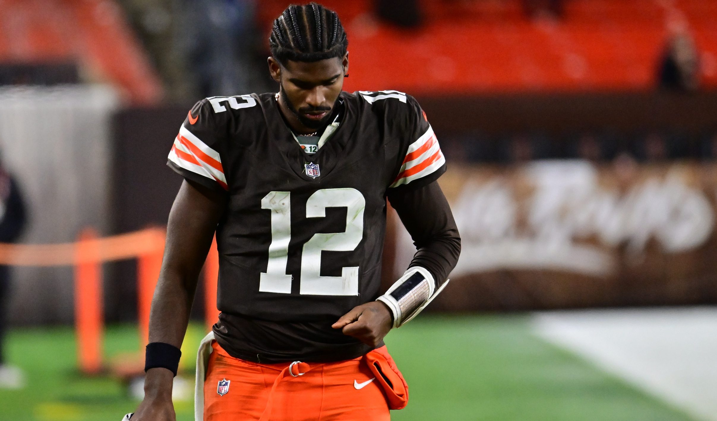 Nov 16, 2025; Cleveland, Ohio, USA; Cleveland Browns quarterback Shedeur Sanders (12) walks off the field following a game against the Baltimore Ravens at Huntington Bank Field. Mandatory Credit: Ken Blaze-Imagn Images