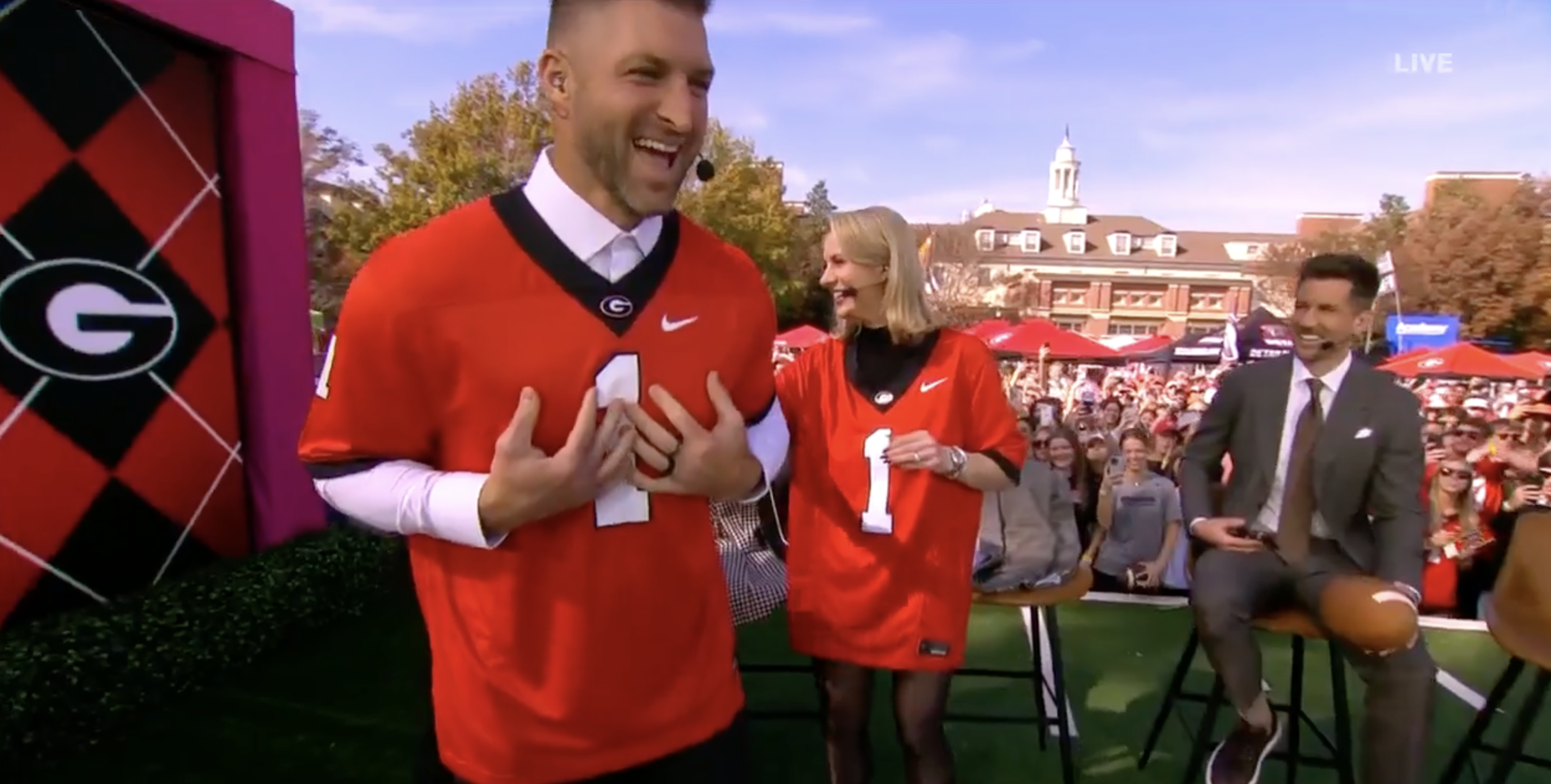 Tim Tebow and Laura Rutledge wear Georgia jerseys to pay off bet