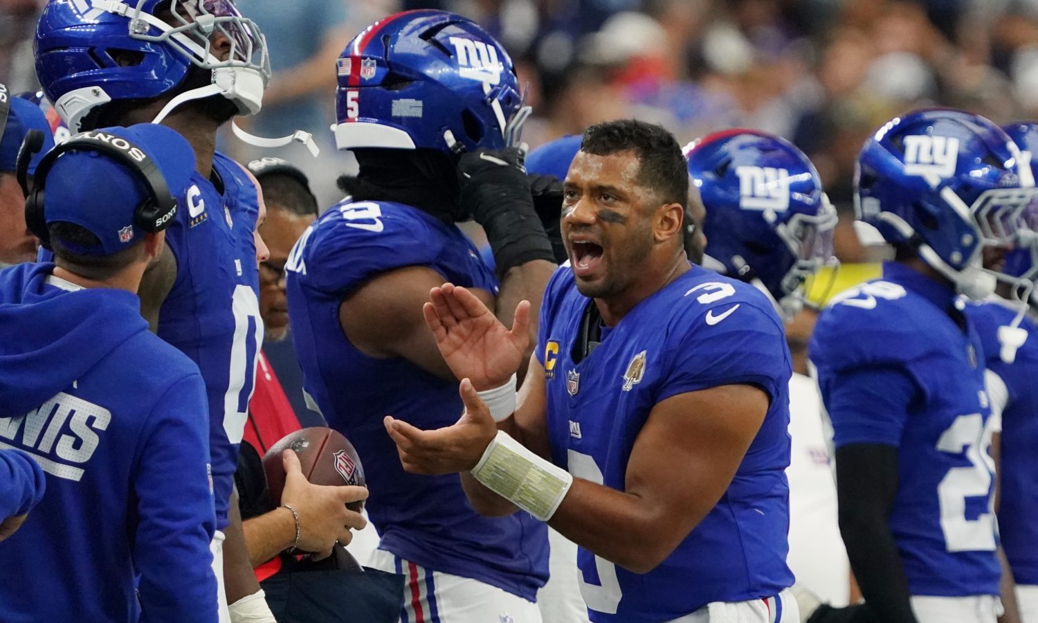Sep 14, 2025; Arlington, Texas, USA; New York Giants quarterback Russell Wilson (3) claps after a play against the Dallas Cowboys during the fourth quarter at AT&T Stadium.
