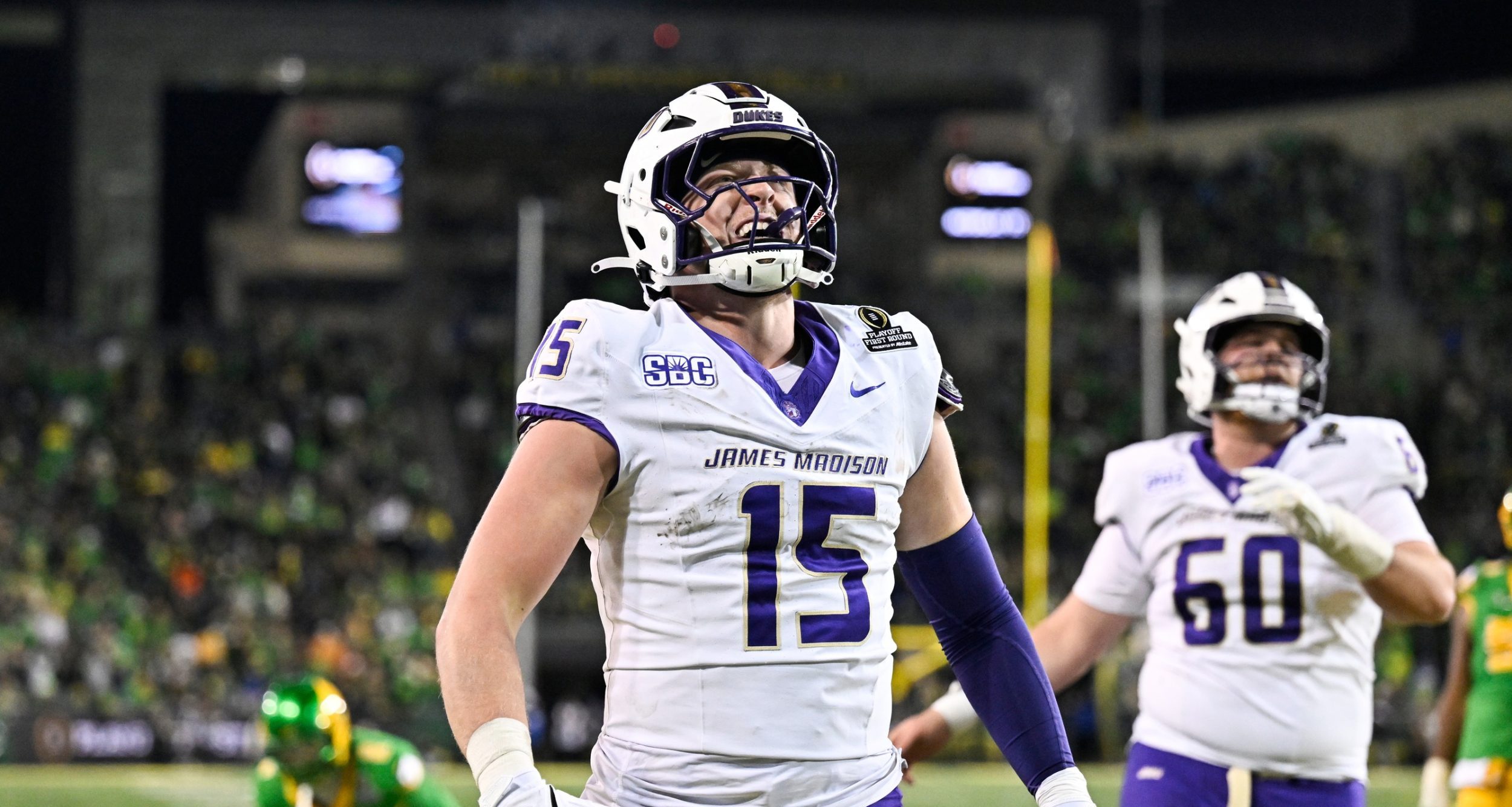 James Madison Dukes tight end Lacota Dippre (15) celebrates after scoring a touchdown during the fourth quarter against the Oregon Ducks at Autzen Stadium.