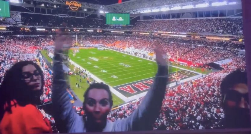 The ESPN 4K broadcast of the College Football Playoff National Championship featured people learning they're standing in front of the camera during commercial-free breaks in action. Credit: ESPN