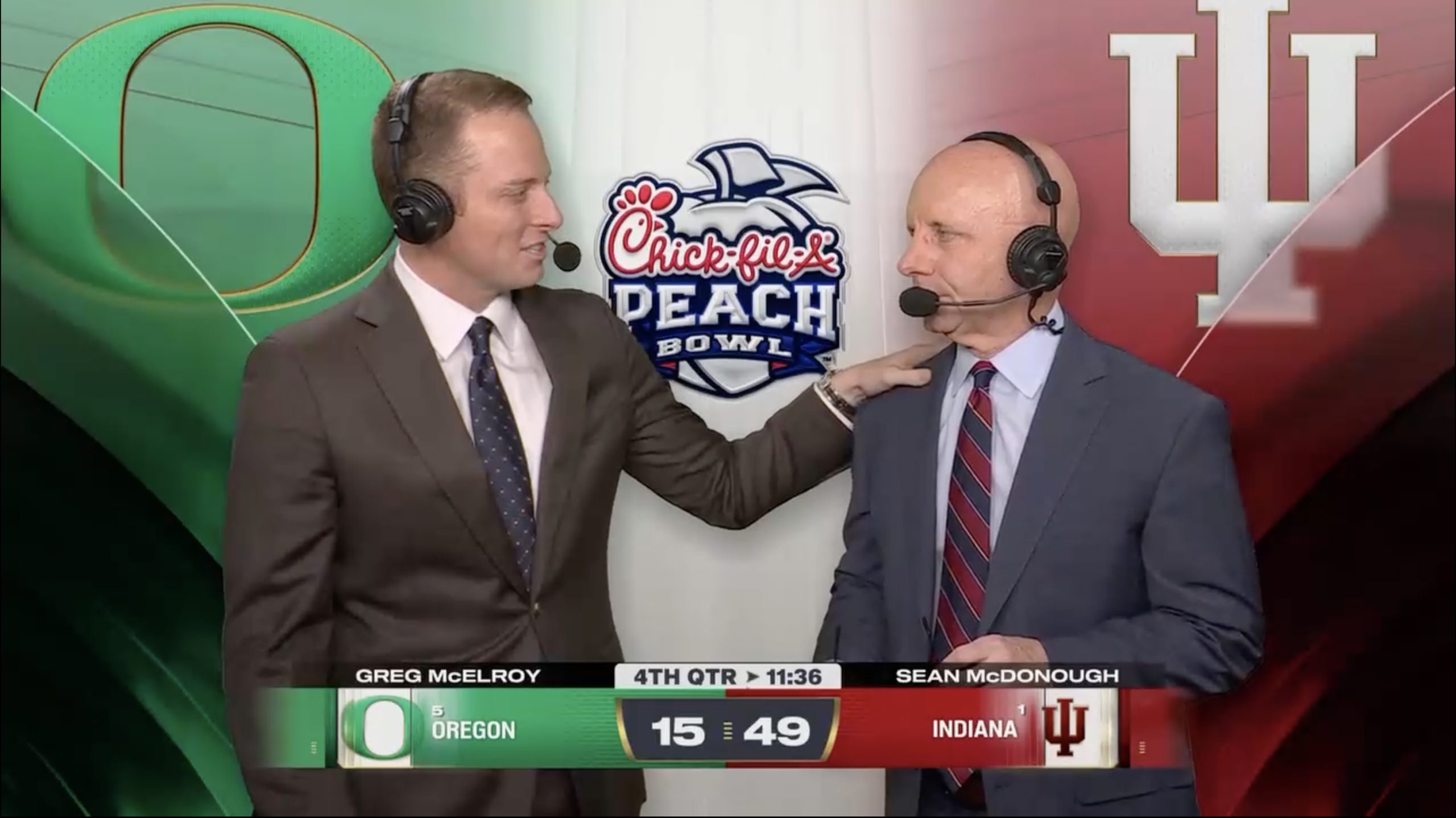 Greg McElroy surprises Sean McDonough with an emotional moment during the Oregon-Indiana College Football Playoff semifinal broadcast on ESPN. Photo Credit: ESPN