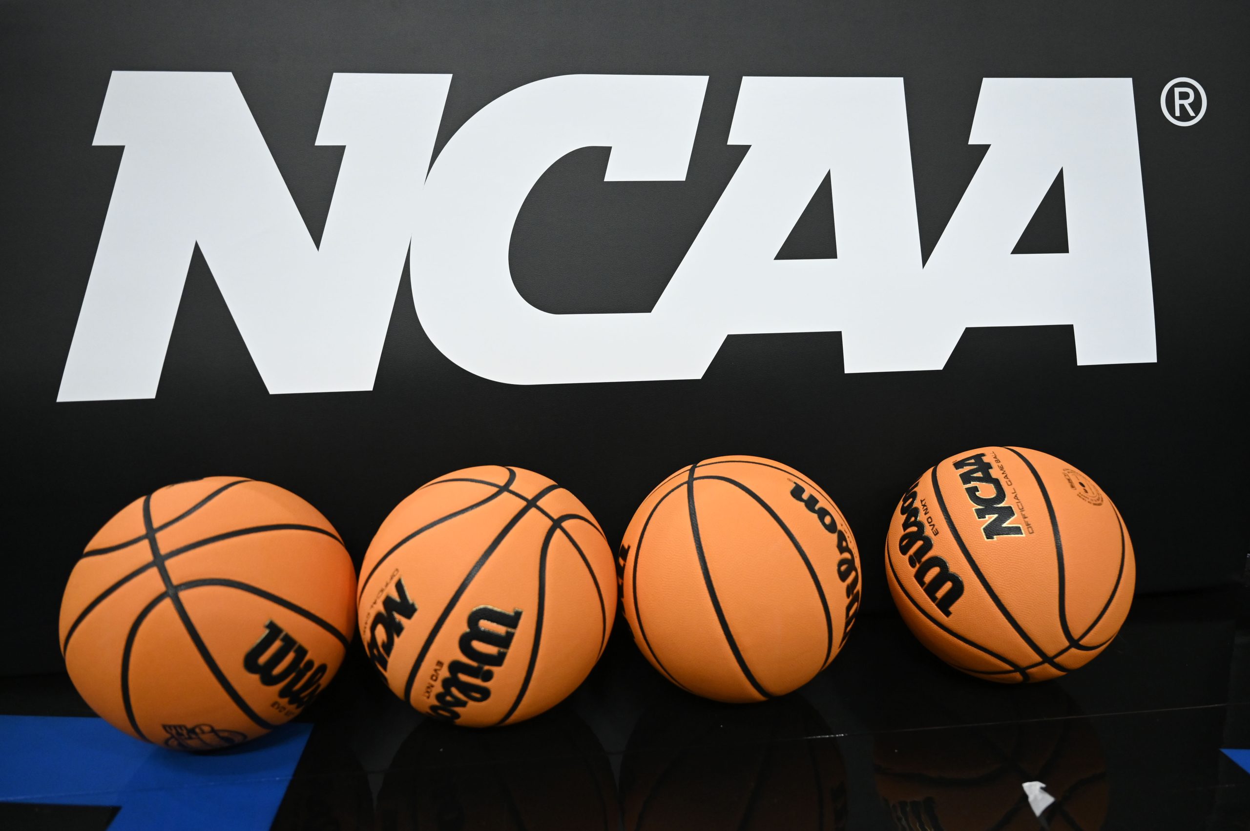 Mar 26, 2025; San Francisco, CA, USA; Detail view of the logo and basketballs during NCAA Tournament West Regional Practice at Chase Center. Mandatory Credit: Eakin Howard-Imagn Images