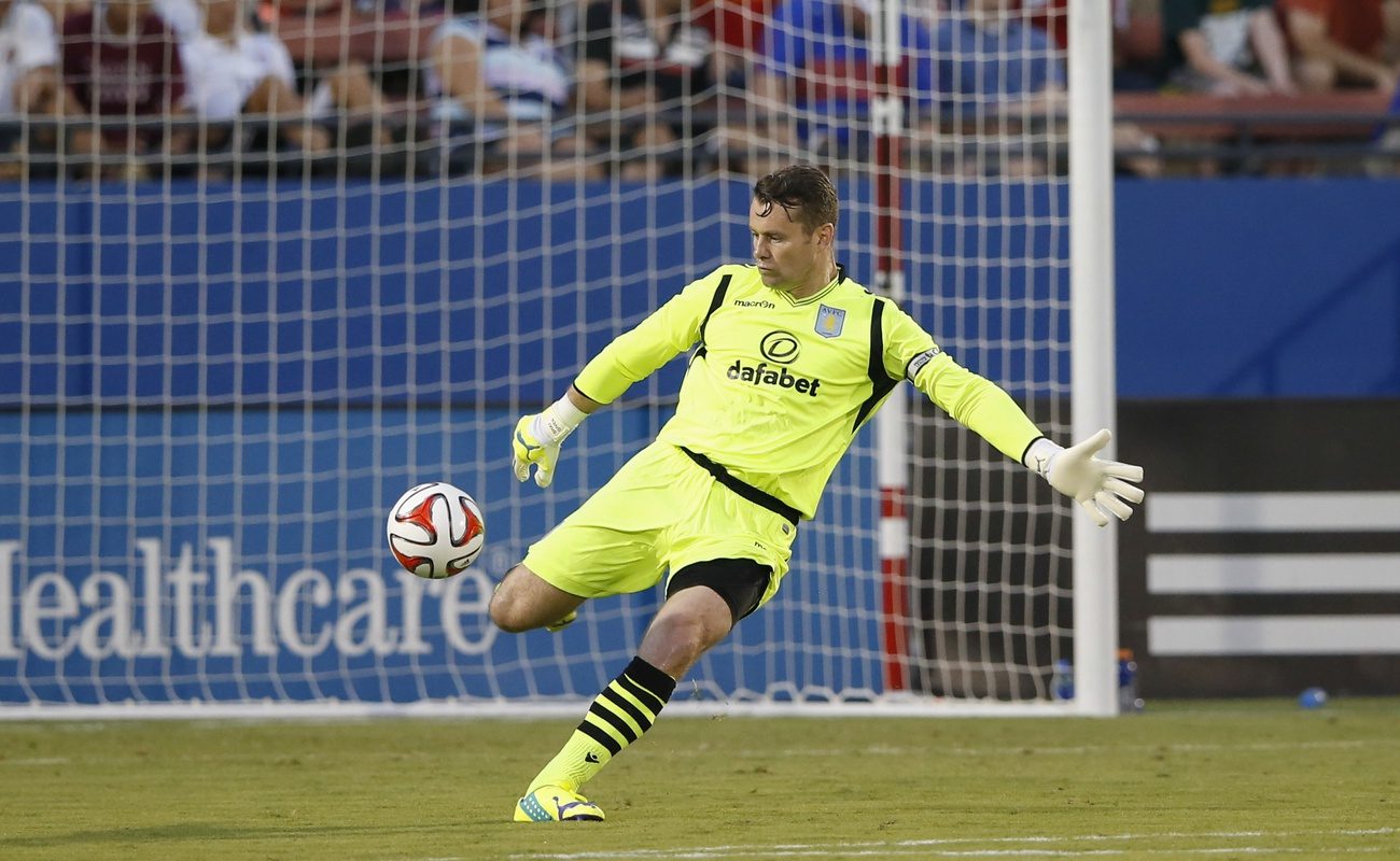 Aston Villa goalkeeper Shay Given (31) kicks the ball during the game against FC Dallas at Toyota Stadium.