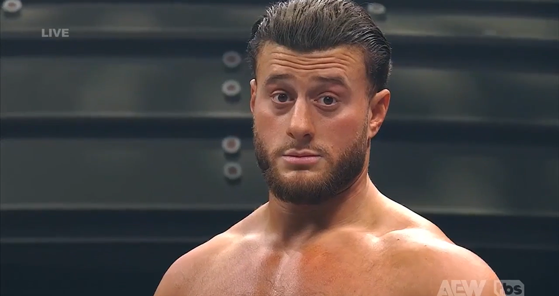 Maxwell Jacob Friedman reacts as 'F*ck ICE' chants ring out during the main event of 'AEW Dynamite'