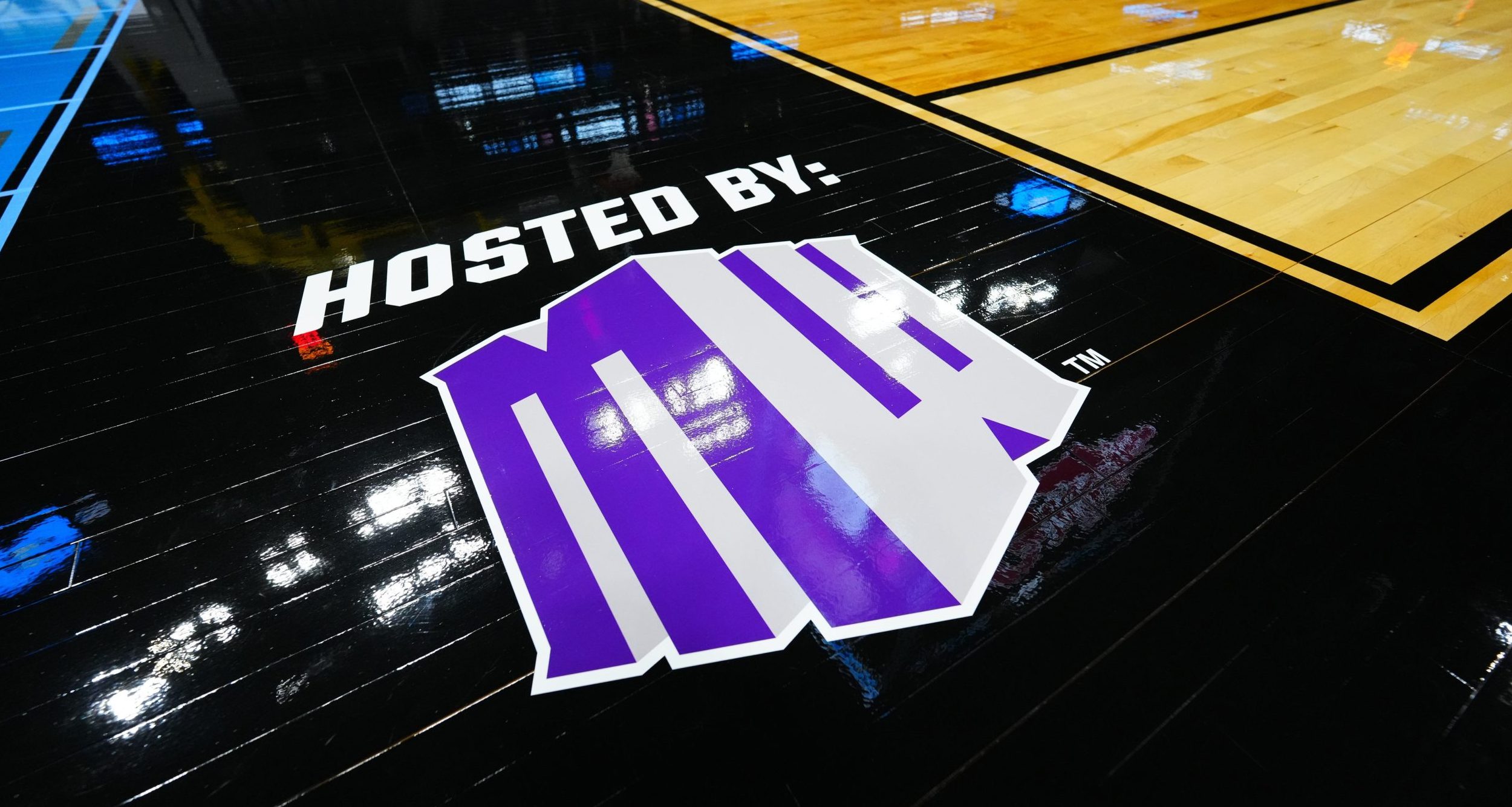 General view of a Mountain West host logo