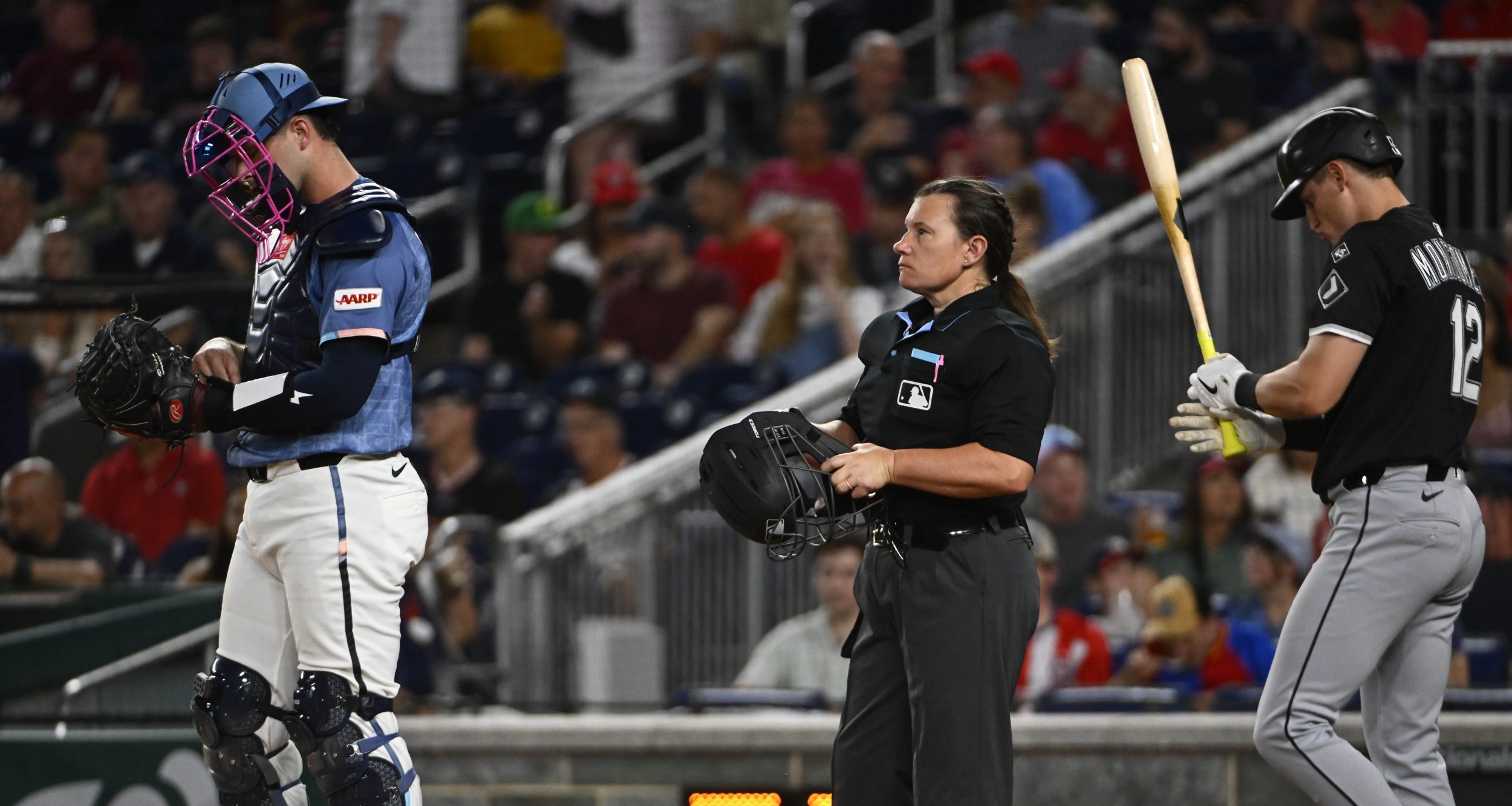 Sep 26, 2025; Washington, District of Columbia, USA; Umpire Jen Pawol looks on during the game between the Washington Nationals and the Chicago White Sox at Nationals Park.