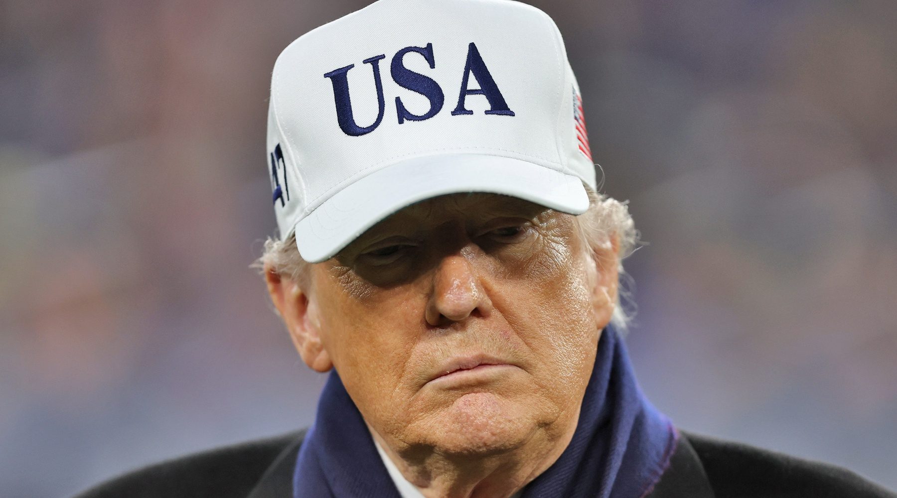 President Donald J. Trump stands on the field during the first half of the 126th Army-Navy game at M&T Bank Stadium.