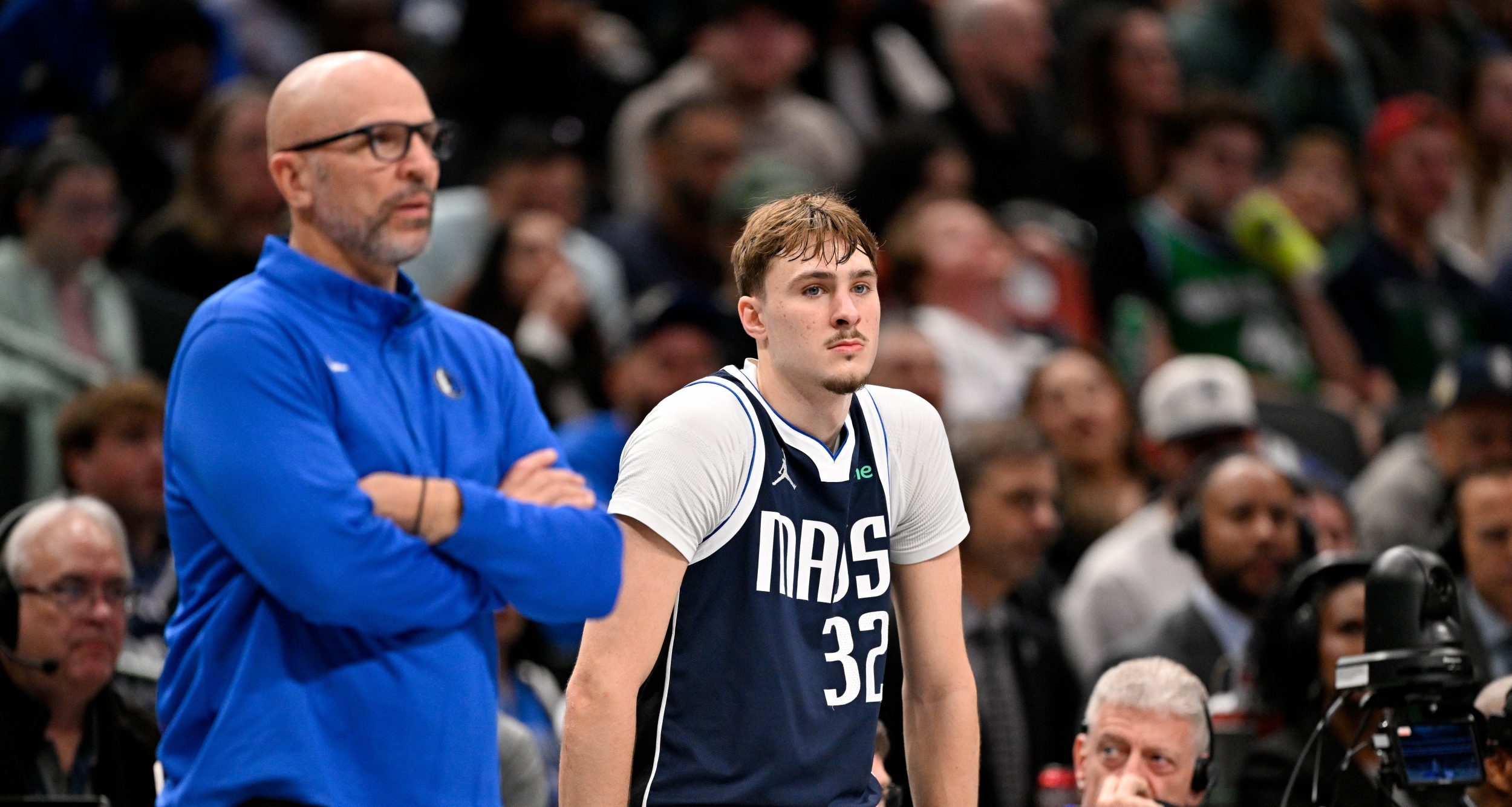 Jan 1, 2026; Dallas, Texas, USA; Dallas Mavericks head coach Jason Kidd and forward Cooper Flagg (32) look on during the second half against the Philadelphia 76ers at the American Airlines Center.