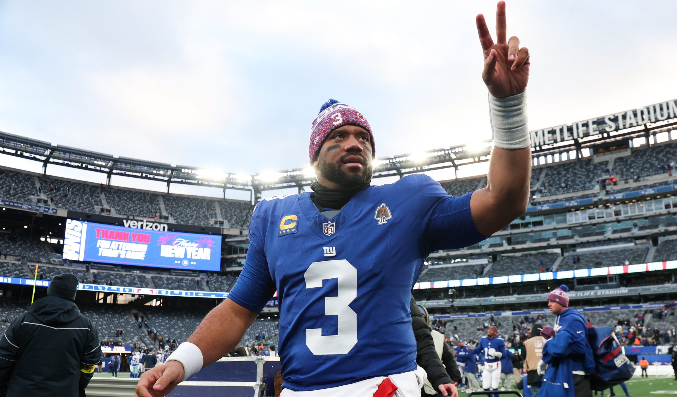 Jan 4, 2026; East Rutherford, New Jersey, USA; New York Giants quarterback Russell Wilson (3) waves to fans after the game against the Dallas Cowboys at MetLife Stadium. Mandatory Credit: Vincent Carchietta-Imagn Images