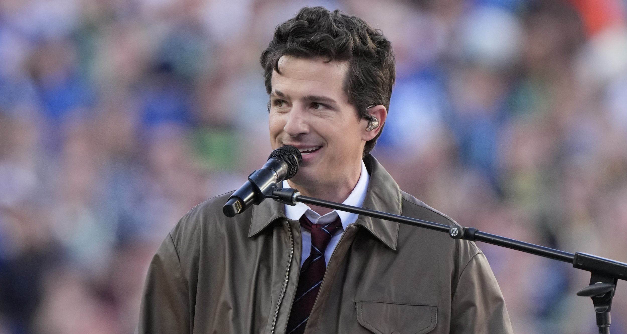 Recording artist Charlie Puth performs the national anthem before Super Bowl LX