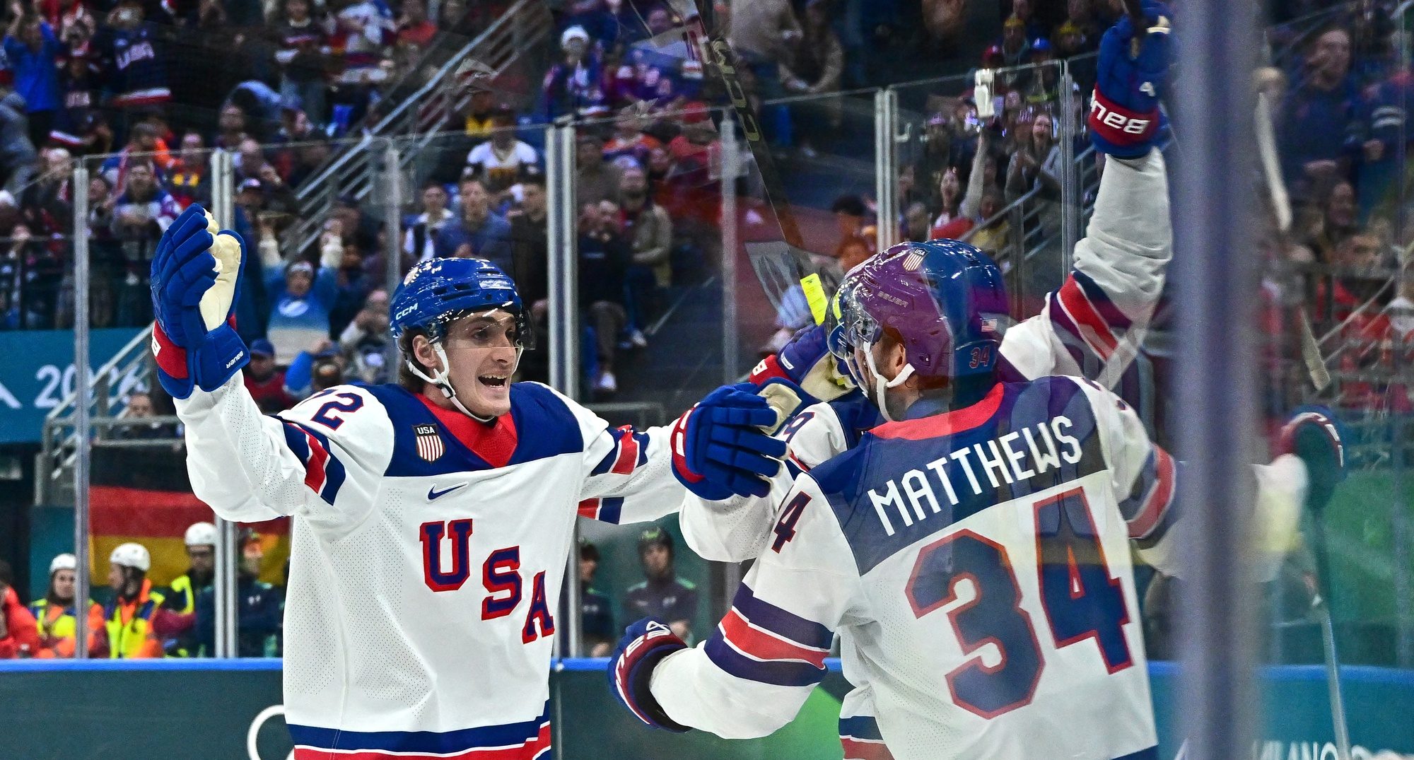 [US, Mexico & Canada customers only] Feb 15, 2026; Milan, Italy; Auston Matthews of United States celebrates scoring their second goal with teammates against Germany in men's ice hockey group A play during the Milano Cortina 2026 Olympic Winter Games at Milano Santagiulia Ice Hockey Arena.