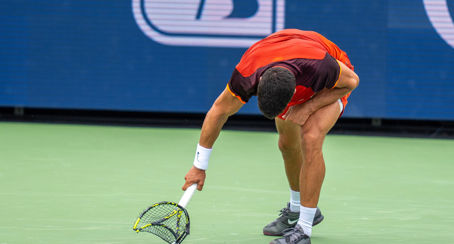 Aug 16, 2024; Cincinnati, OH, USA; Carlos Alcaraz of Spain smashes his racket during his match against Gael Monfils of France on day five of the Cincinnati Open. Mandatory Credit: Susan Mullane-USA TODAY Sports