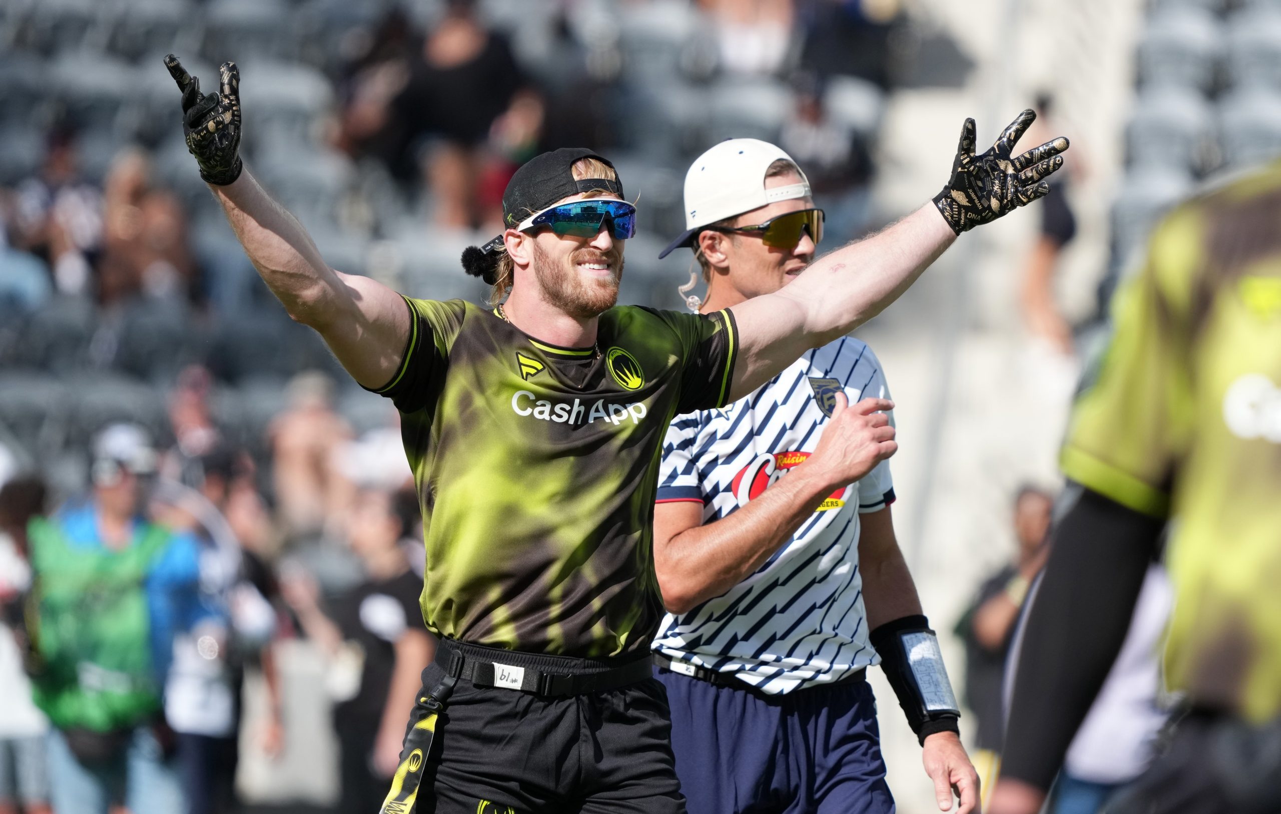 Logan Paul and Tom Brady at the Fanatics Flag Football Classic. Credit: Kirby Lee-Imagn Images