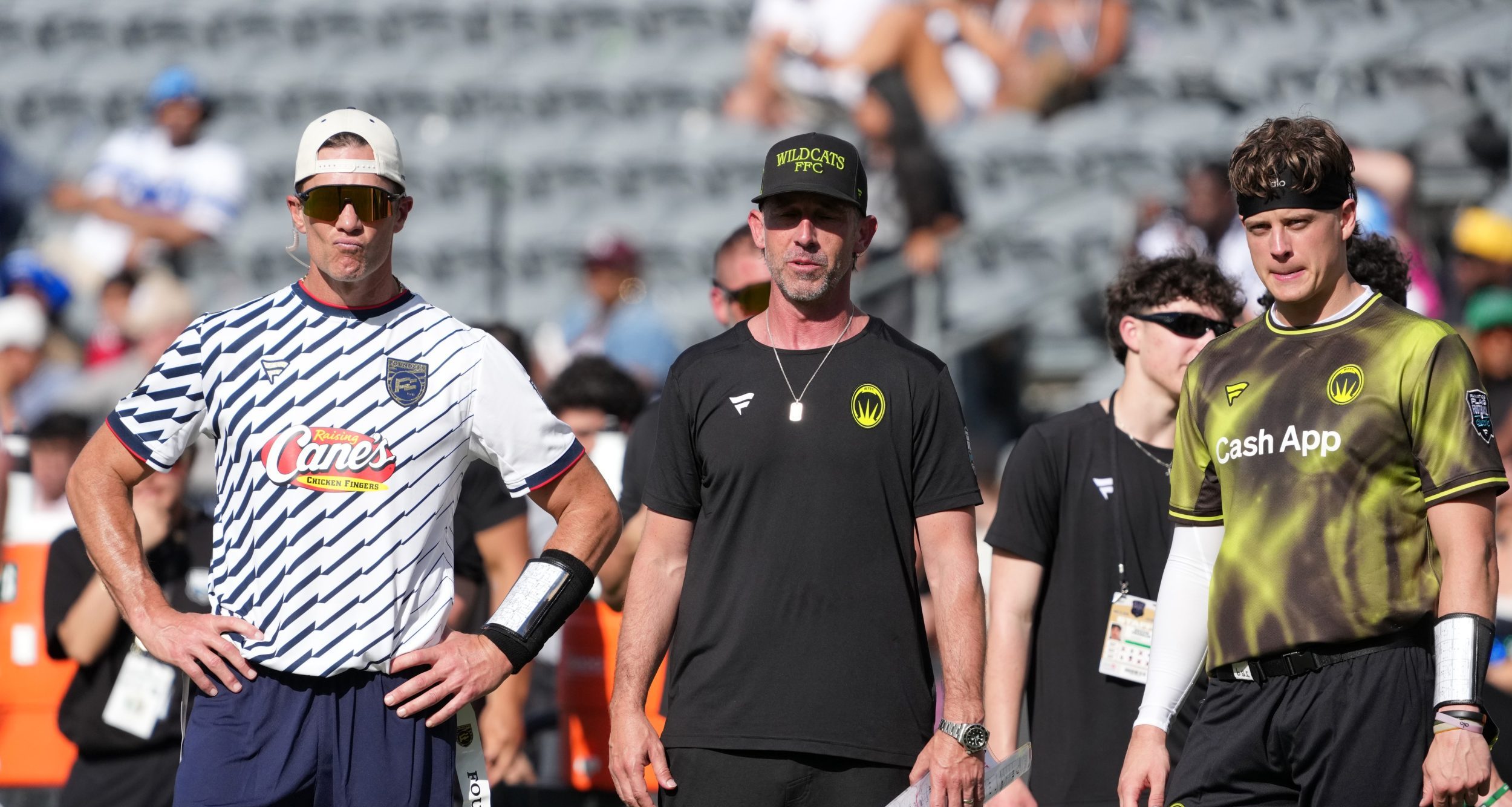 Founders FFC quarterback Tom Brady (left) and Wildcats FFC coach Kyle Shanahan (center) and quarterback Joe Burrow during the Fanatics Flag Football Classic at BMO stadium.