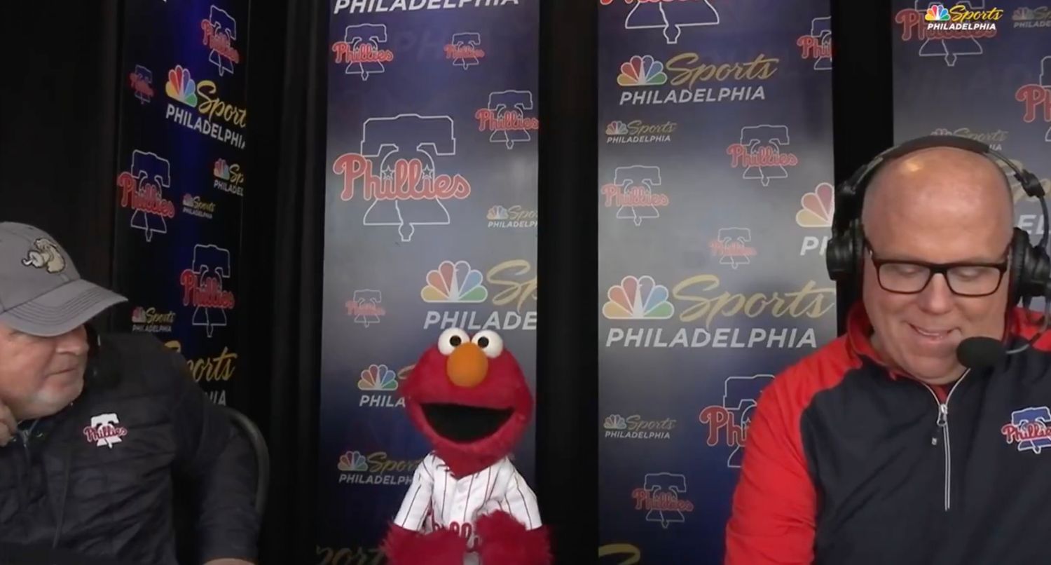'Sesame Street' star Elmo joined Tom McCarthy and John Kruk in the Philadelphia Phillies broadcast booth. Credit: NBC Sports Philadelphia
