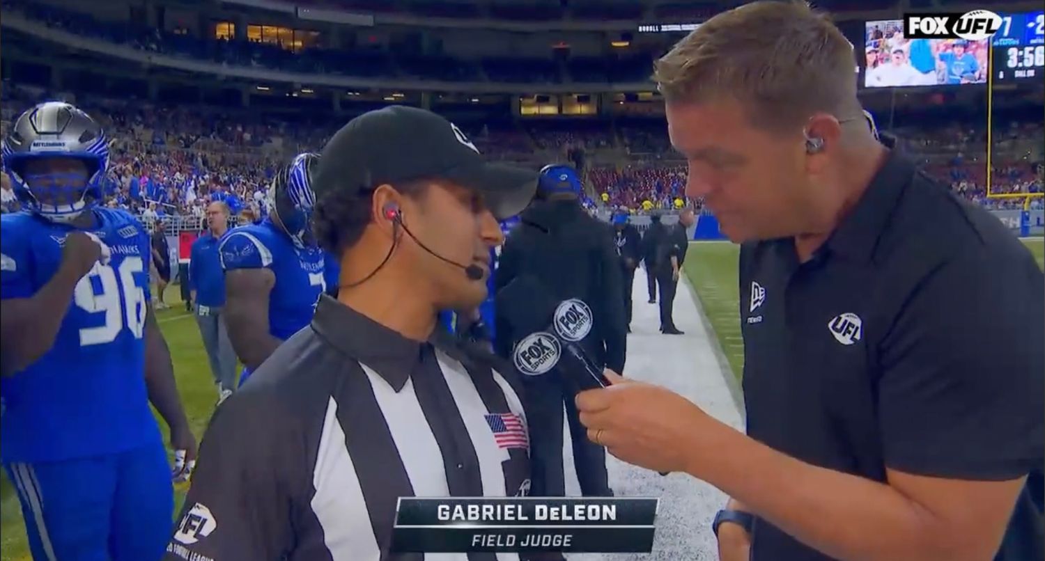 A UFL ref is interviewed by Brock Huard during a game on Fox. Credit: Fox