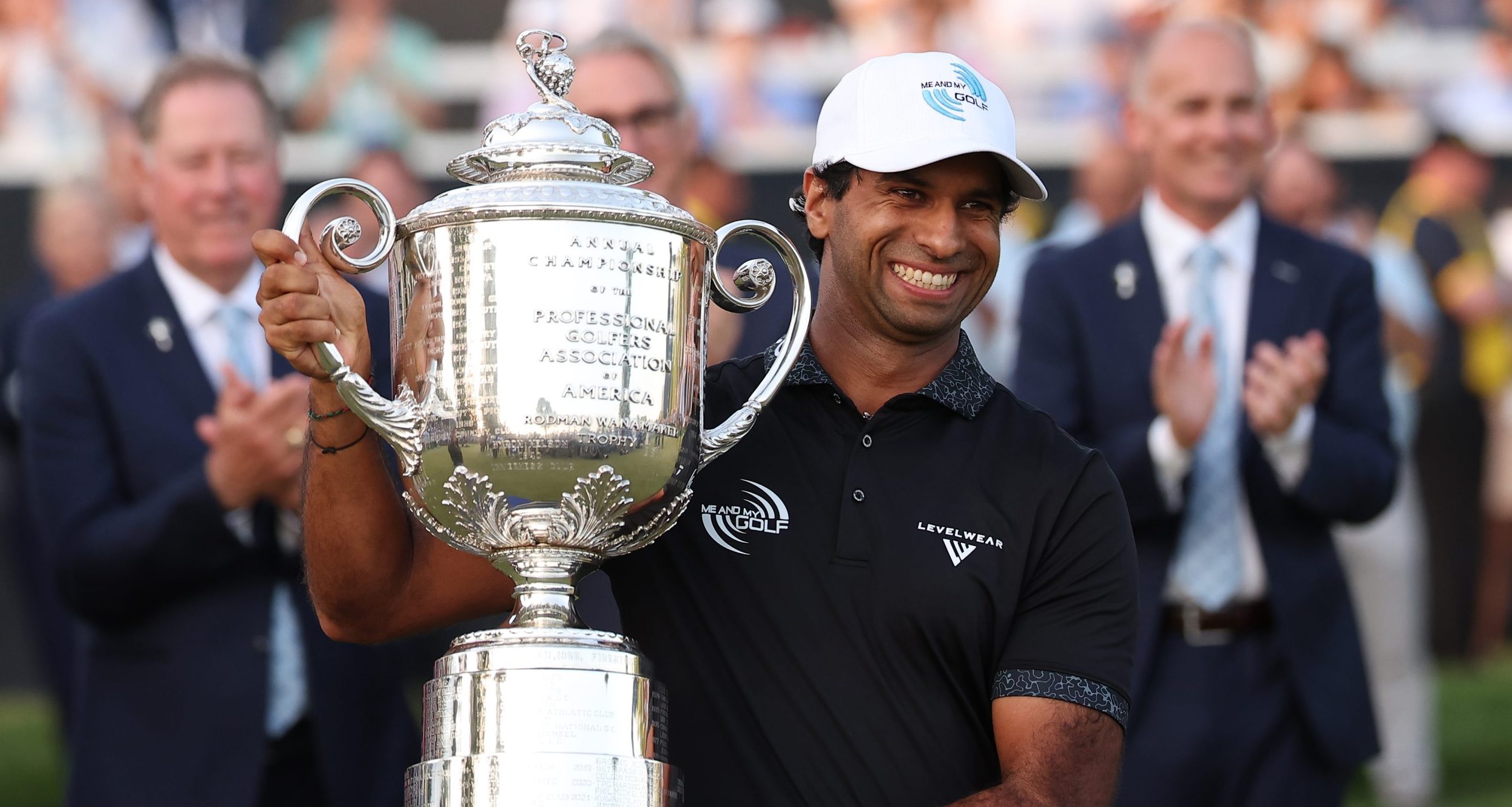 Aaron Rai poses with the trophy after winning the final round of the PGA Championship
