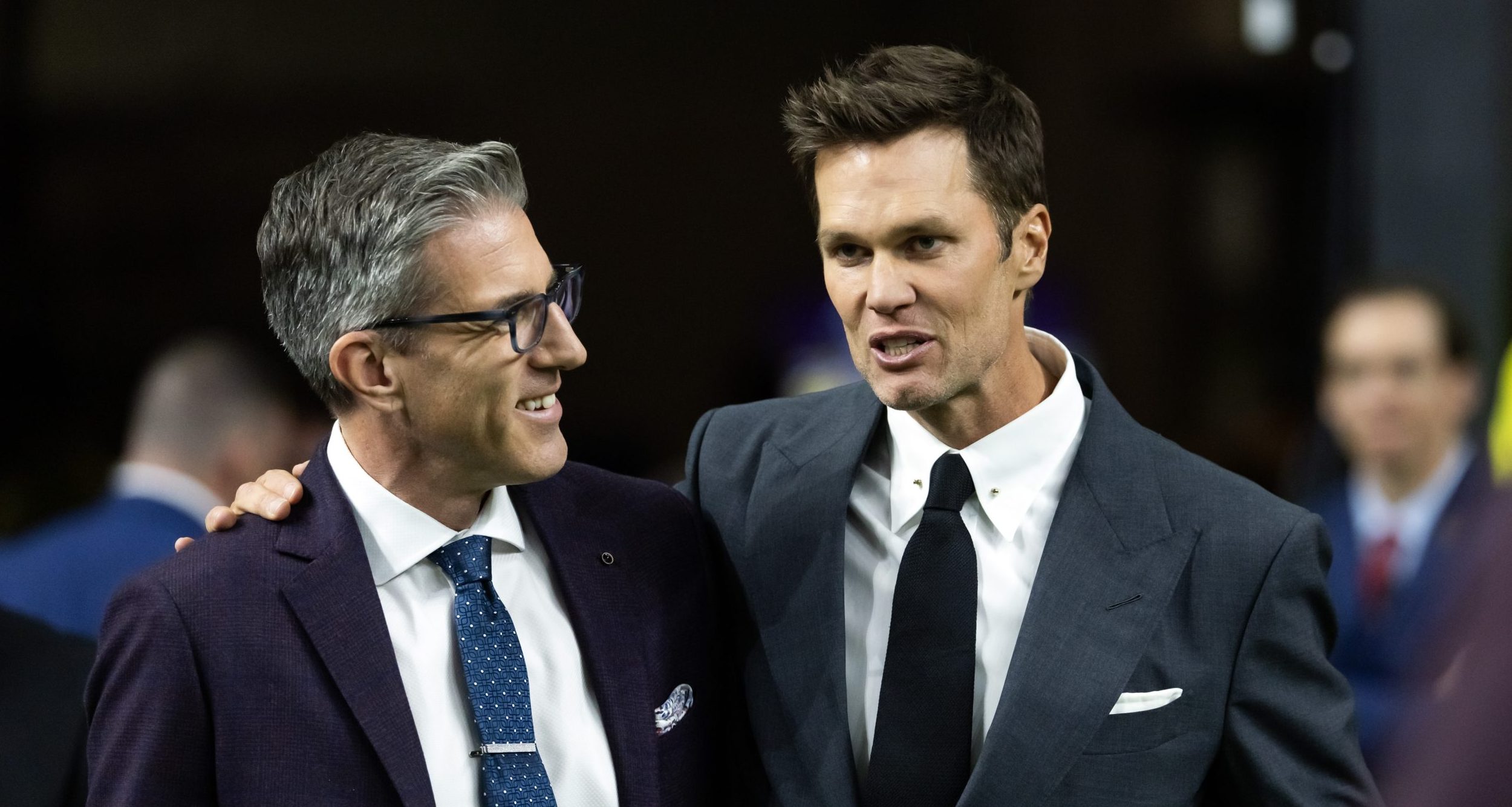 Fox Sports announcer Kevin Burkhardt (left) with Tom Brady