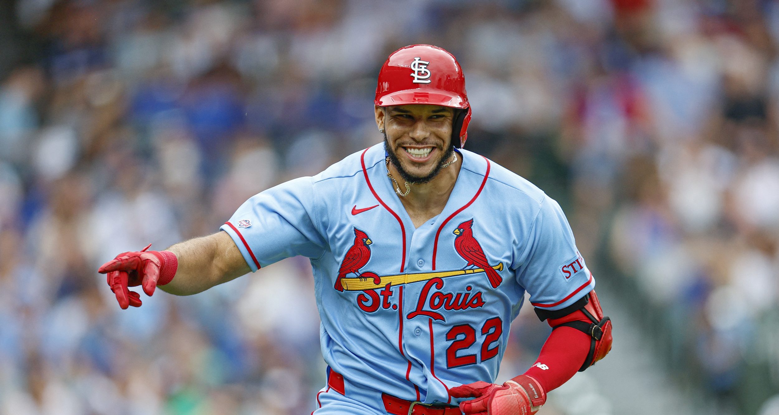 St. Louis Cardinals left fielder Joshua Baez (22) celebrates as he rounds the bases after hitting a two-run home run against the Chicago Cubs during the first inning at Wrigley Field.