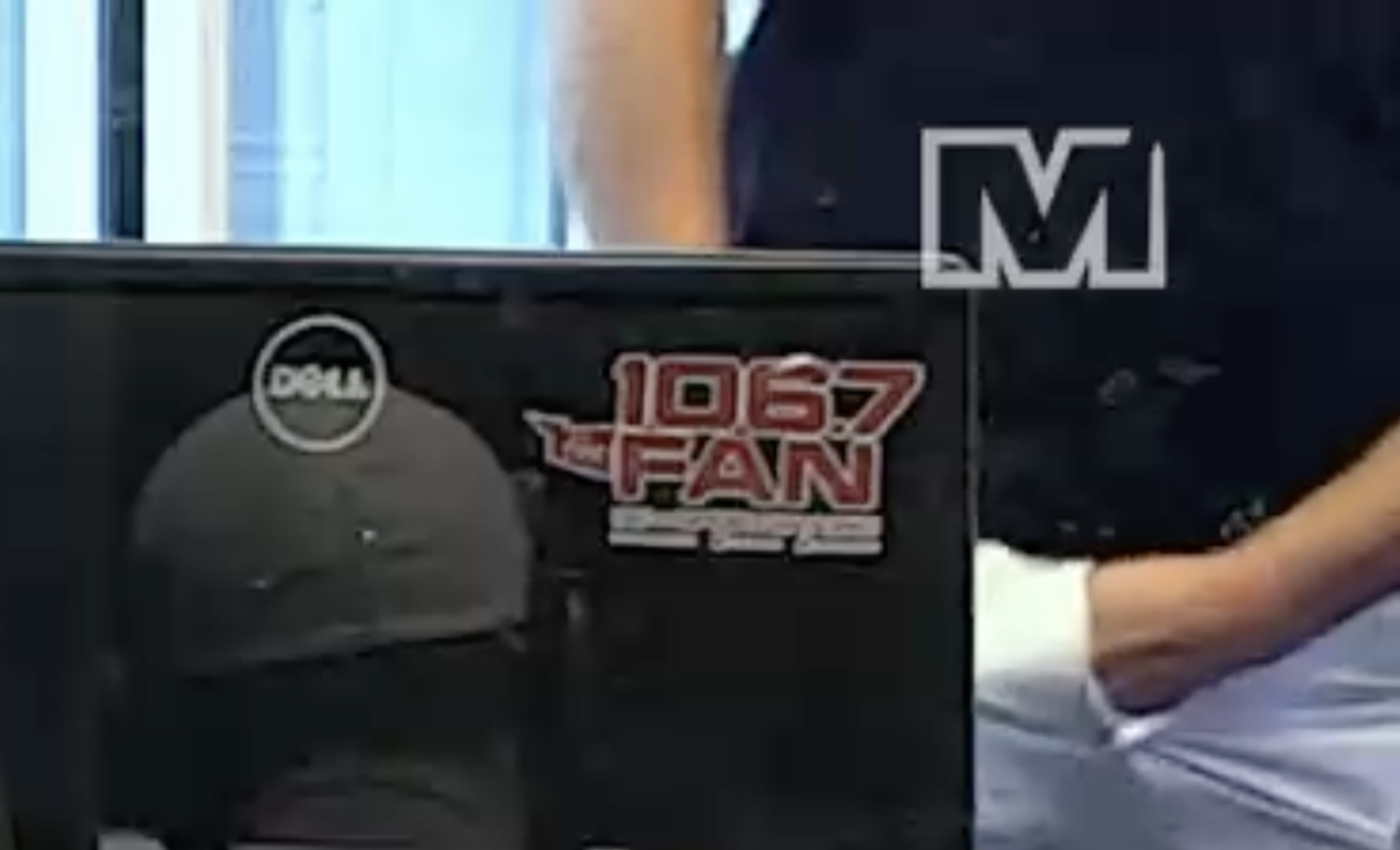 Radio producer caught wrestling something in his pants