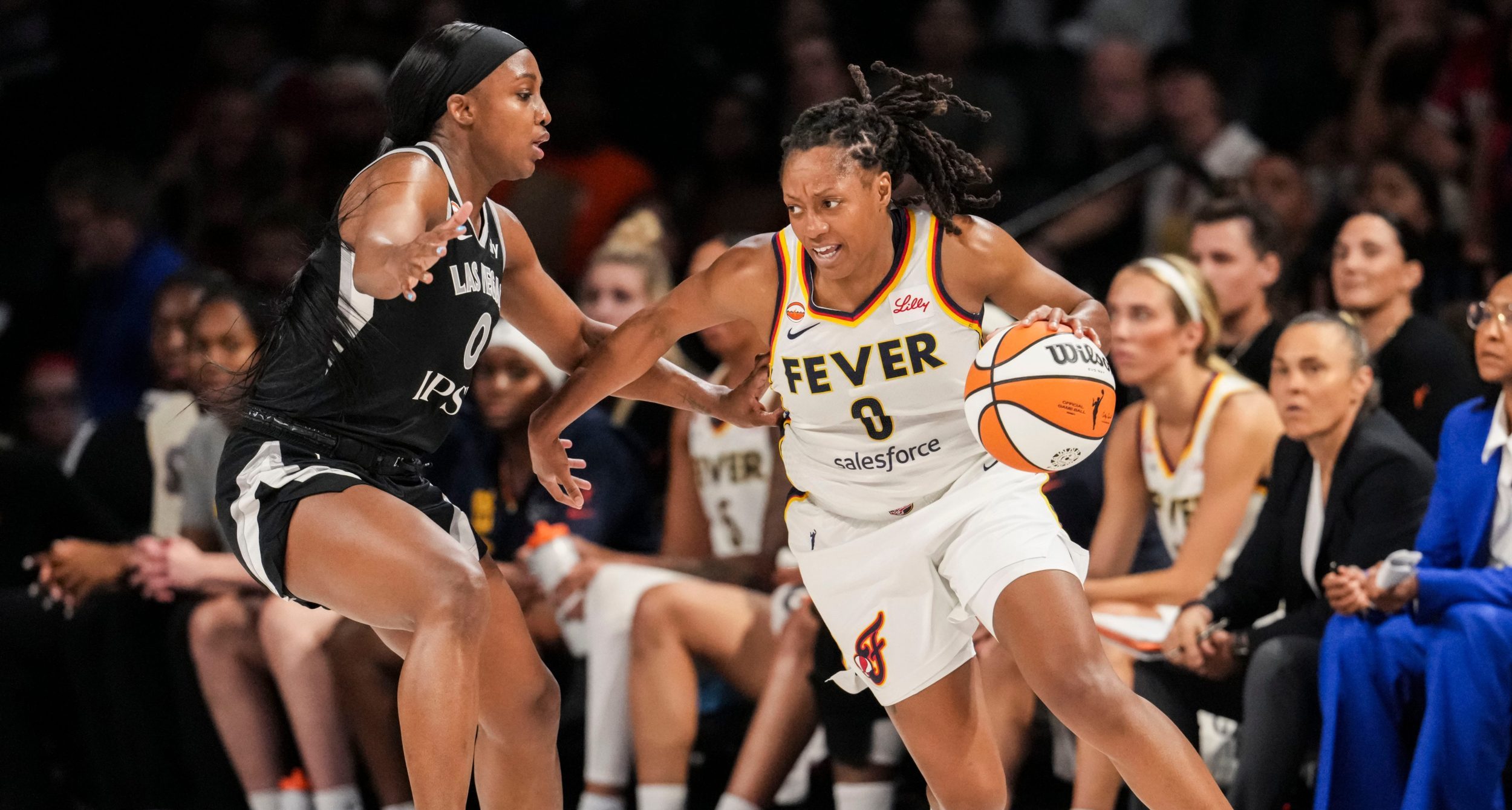 Caitlin Clark passing during WNBA viewership record game on ABC in 2024