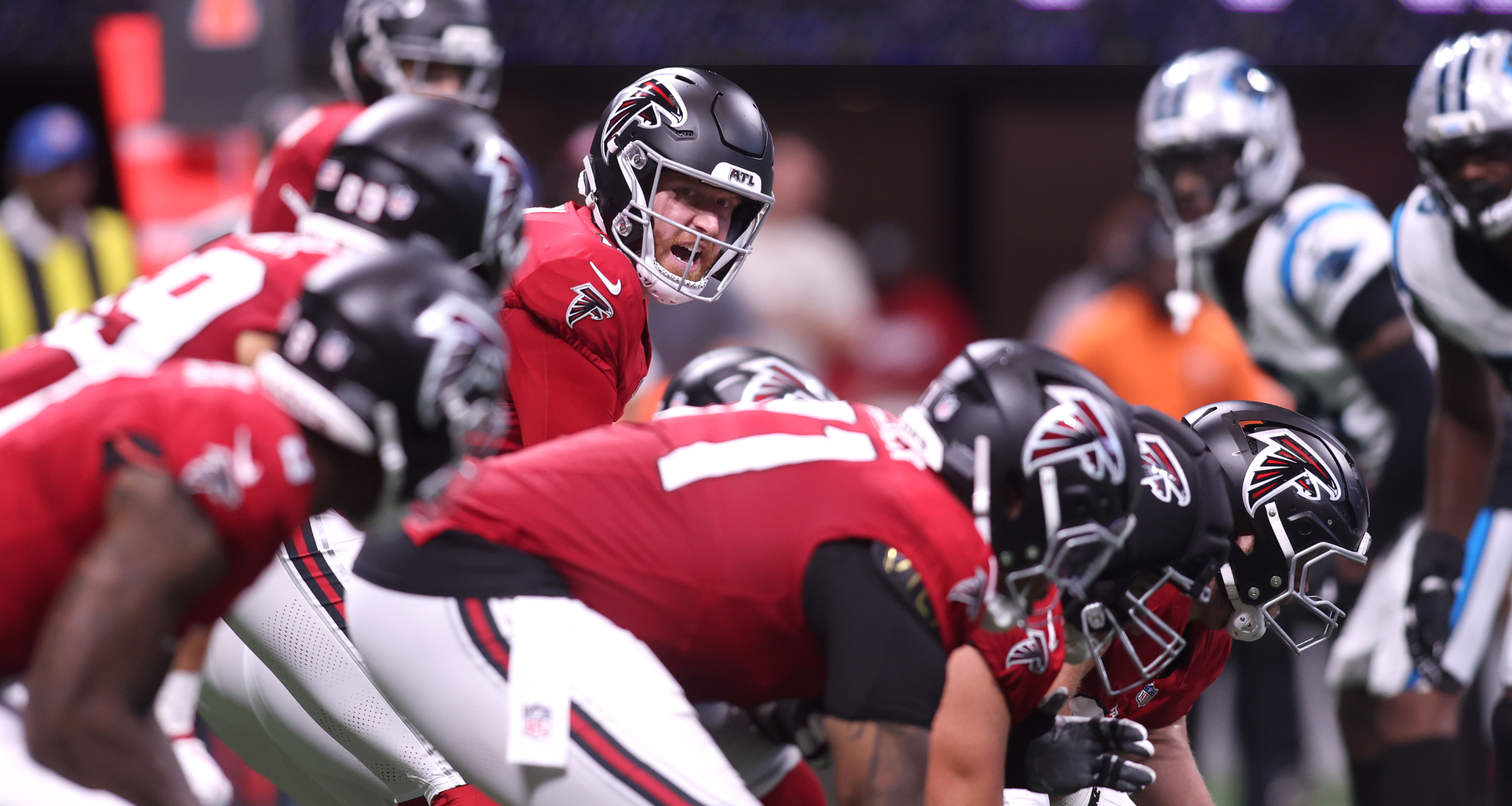 Atlanta Falcons players walking on the field during a national NFL primetime TV broadcast in 2026