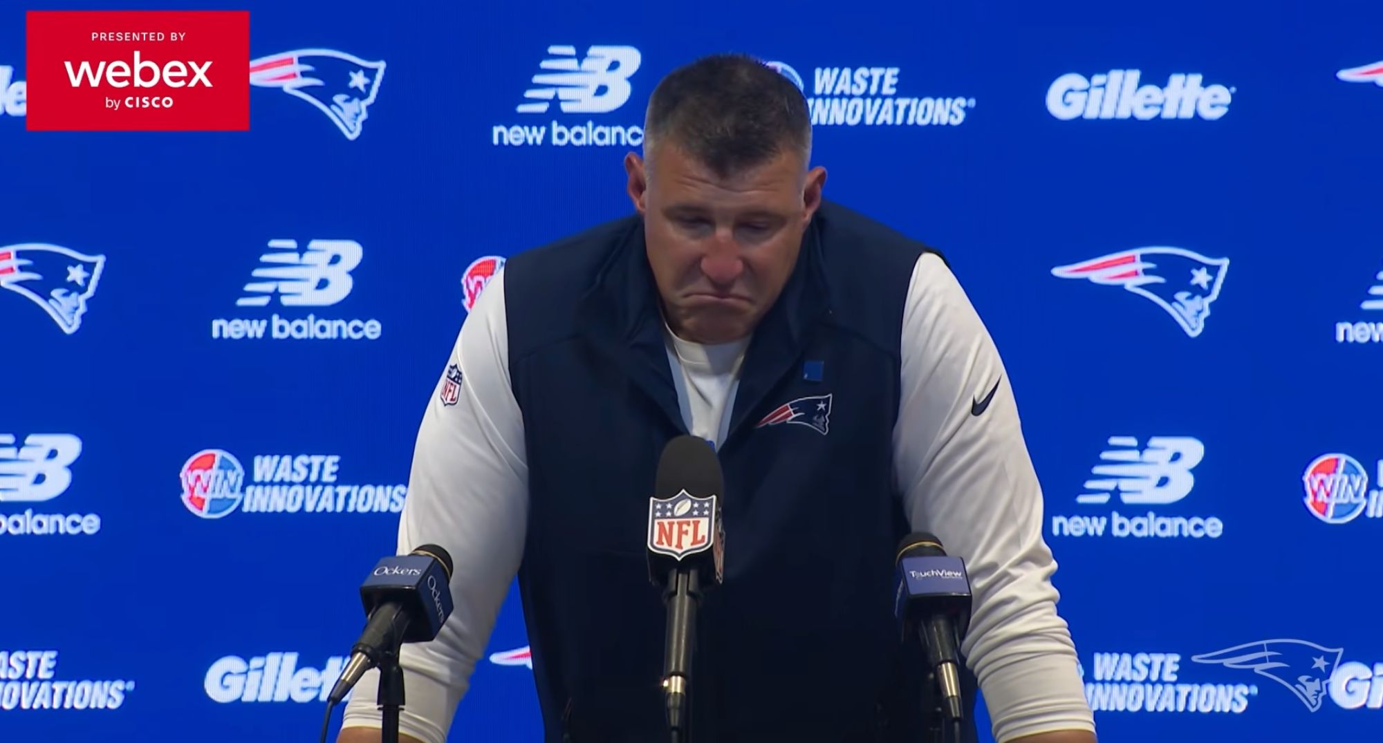 Mike Vrabel reacting to reporters during the postgame press conference