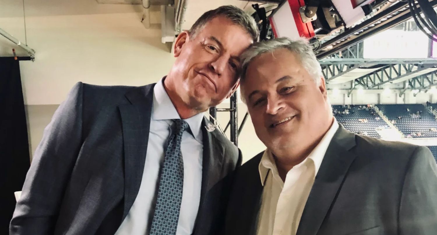 Troy Aikman (left) with longtime spotter David Moulton (right)