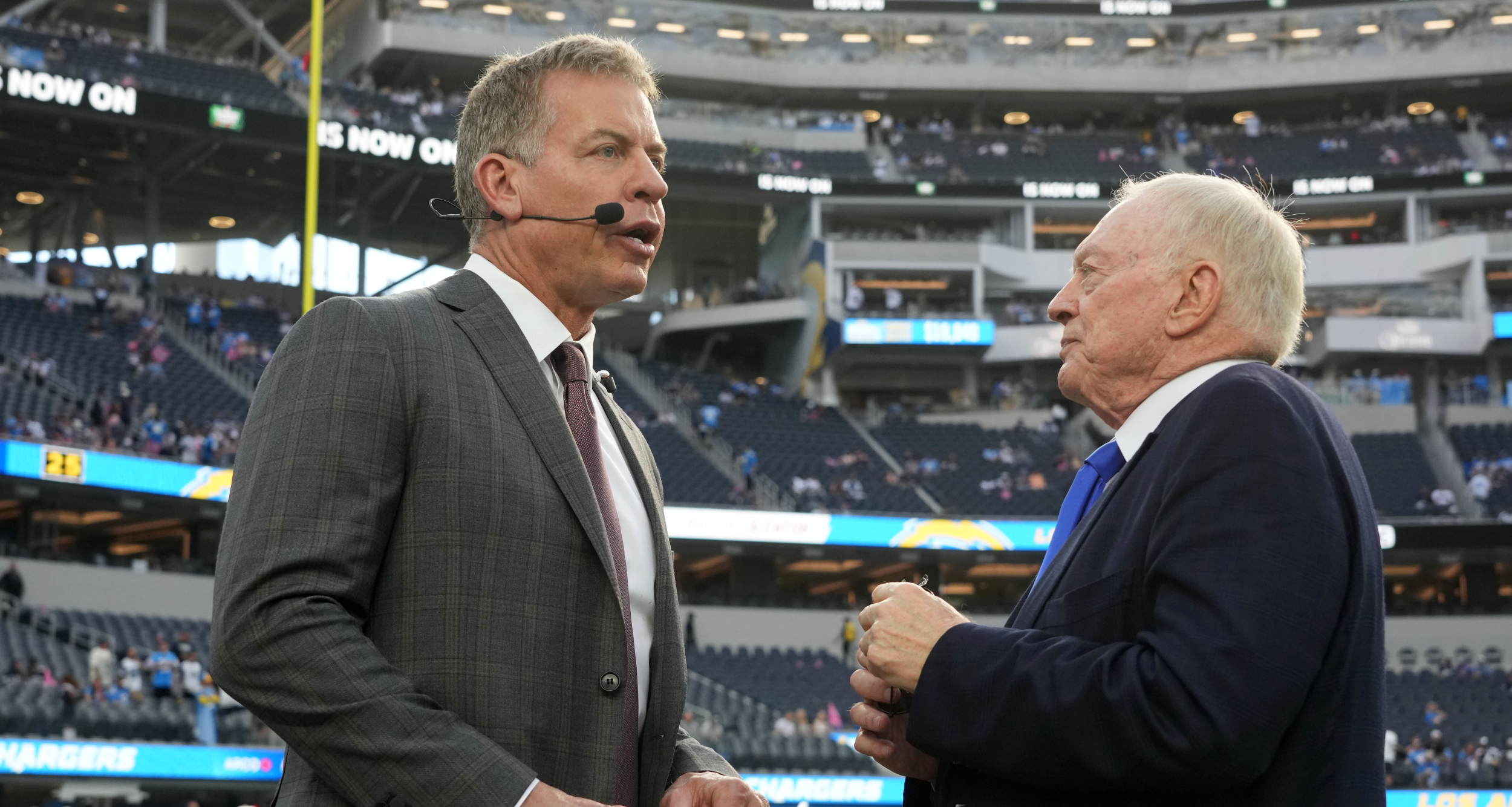 Troy Aikman and Jerry Jones.